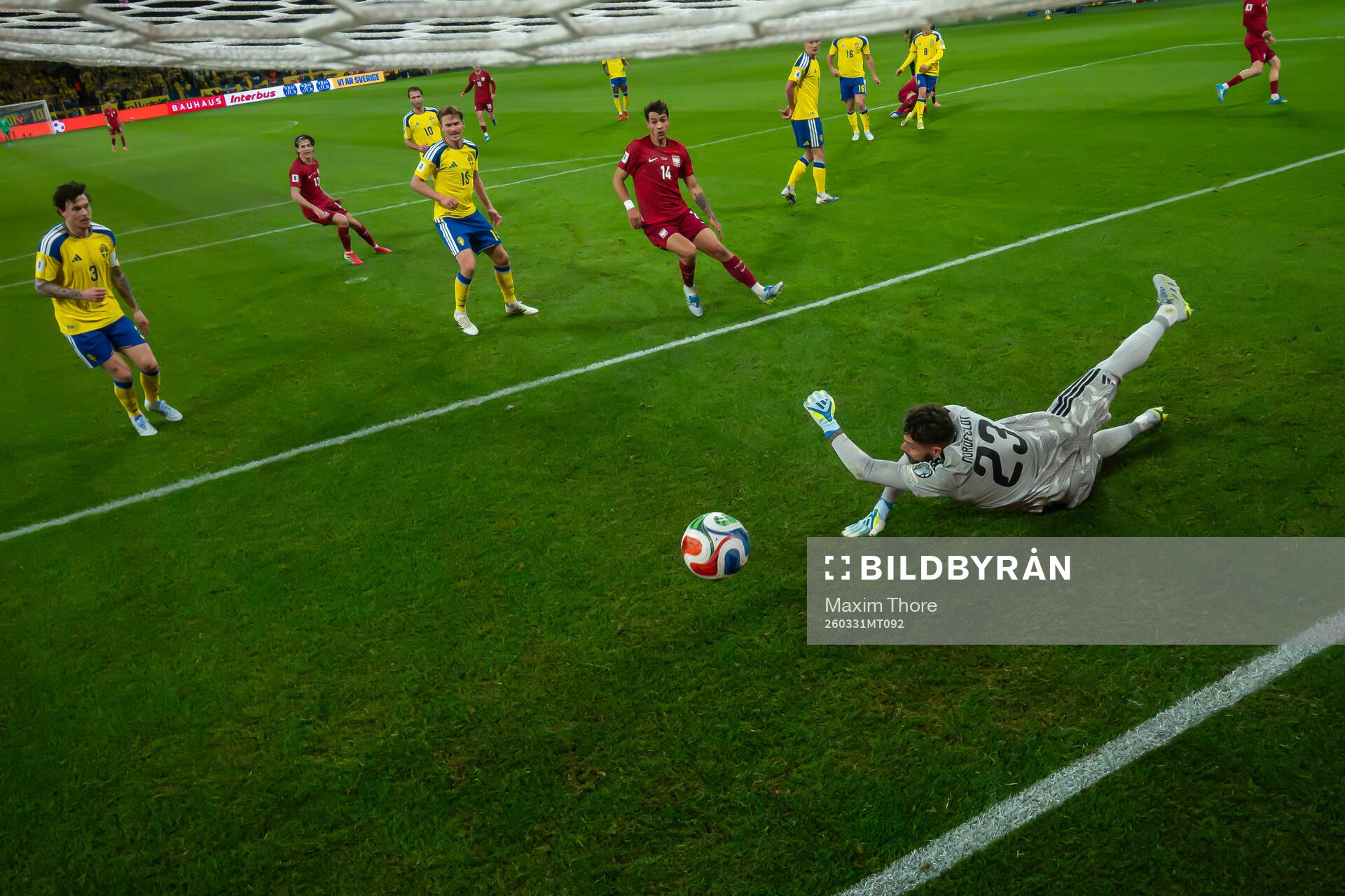 Goalkeeper Kristoffer Nordfeldt of Sweden lets in the 1-1