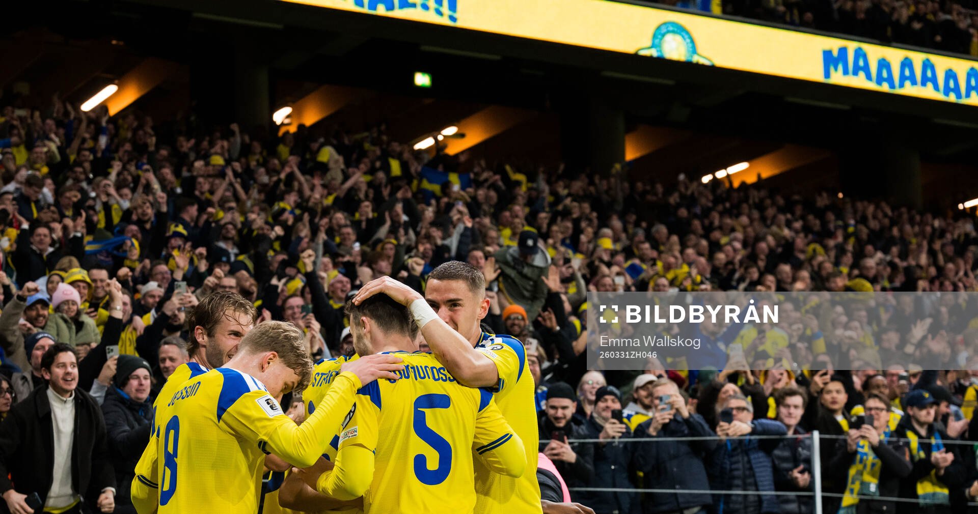 Anthony Elanga of Sweden celebrates with team mates