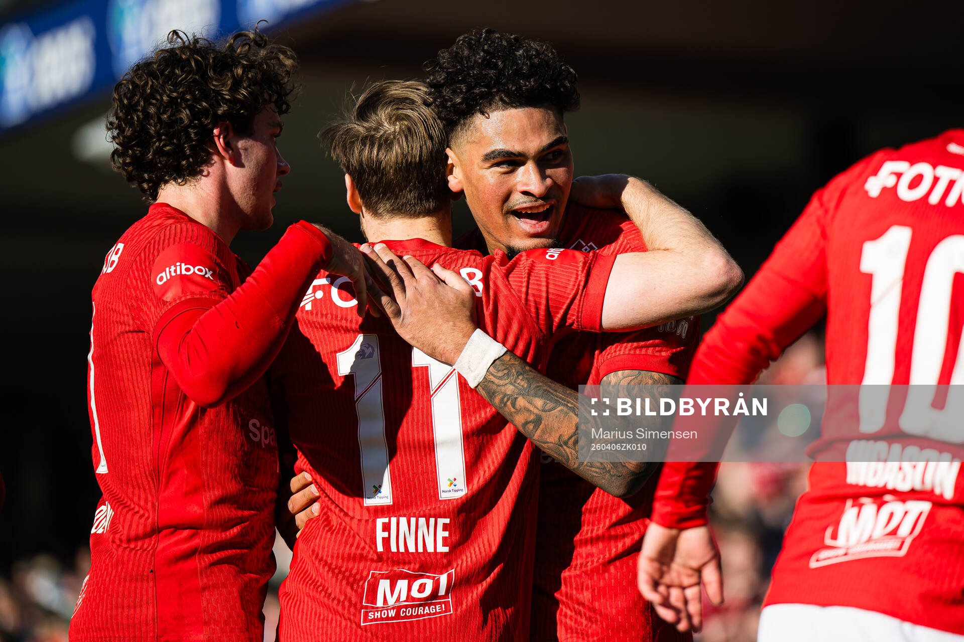 Noah Jean Holm of Brann celebrates