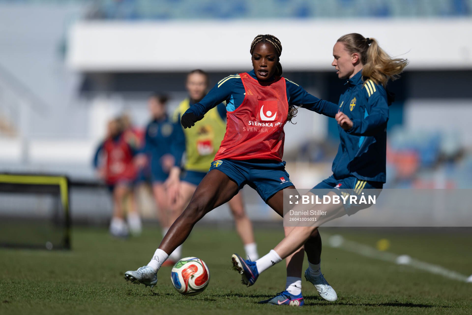 Evelyn Ijeh  at a training session with the women's
