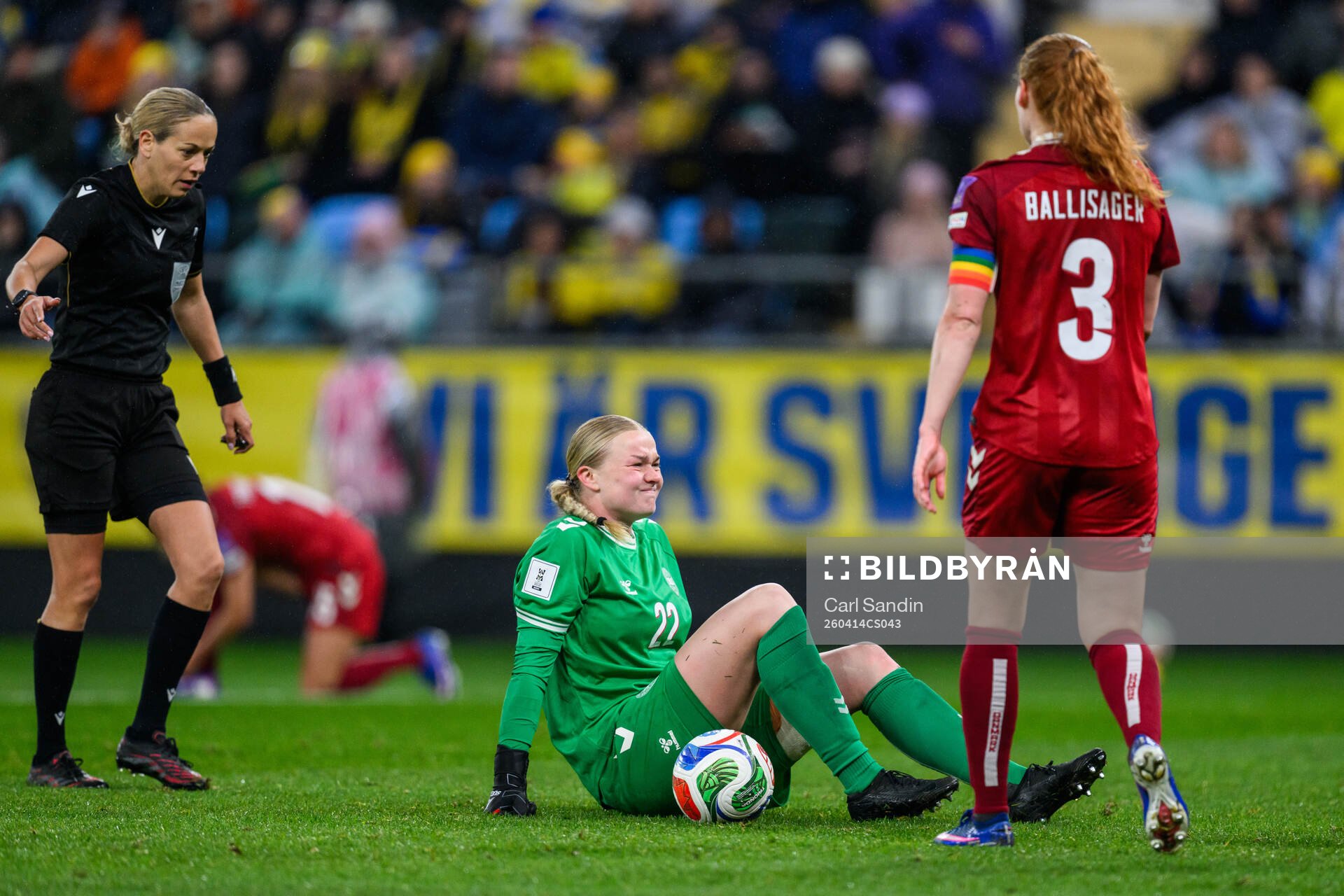 goalkeeper Freja Thisgaard of Denmark in pain
