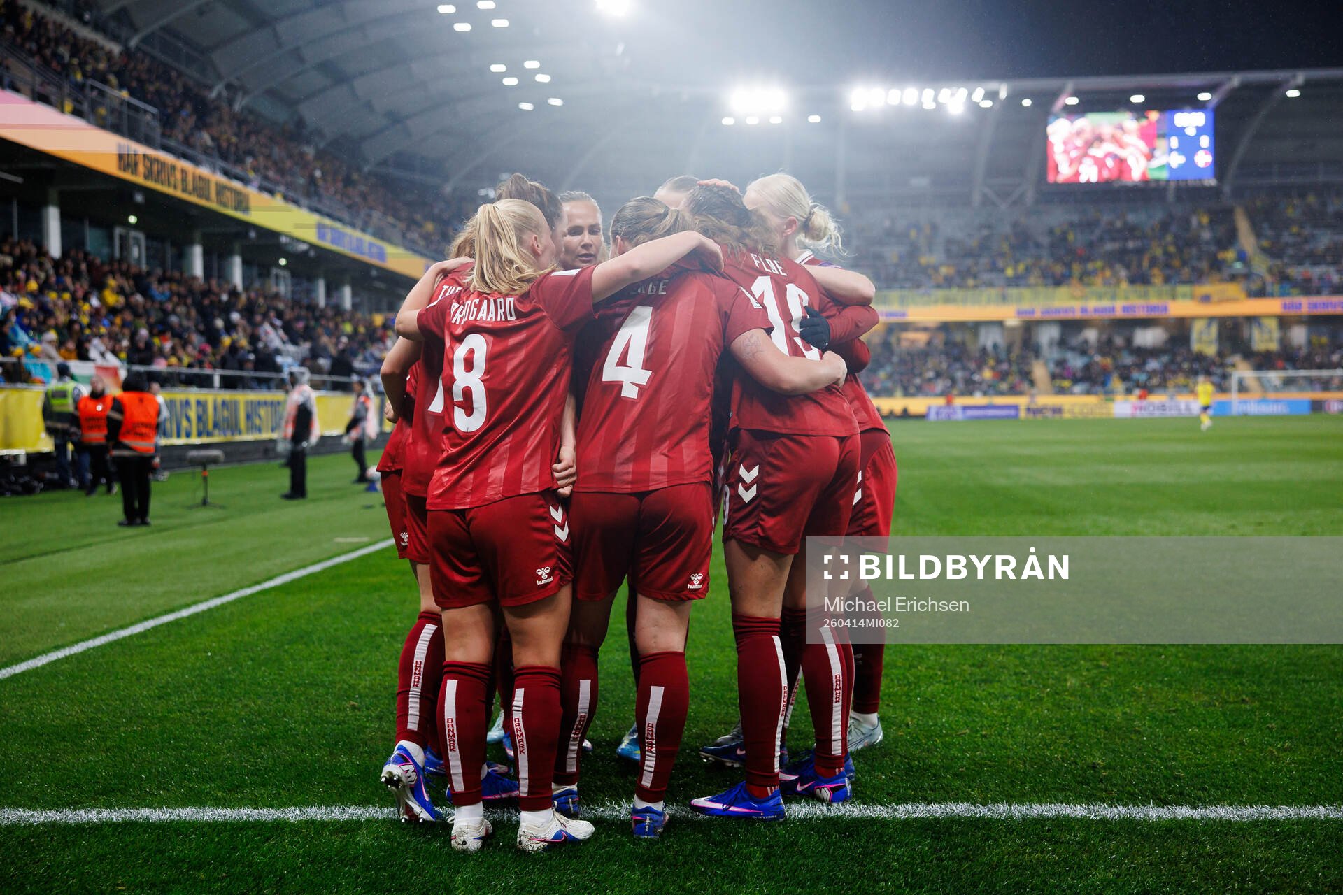 Janni Thomsen of Denmark celebrates with team mates