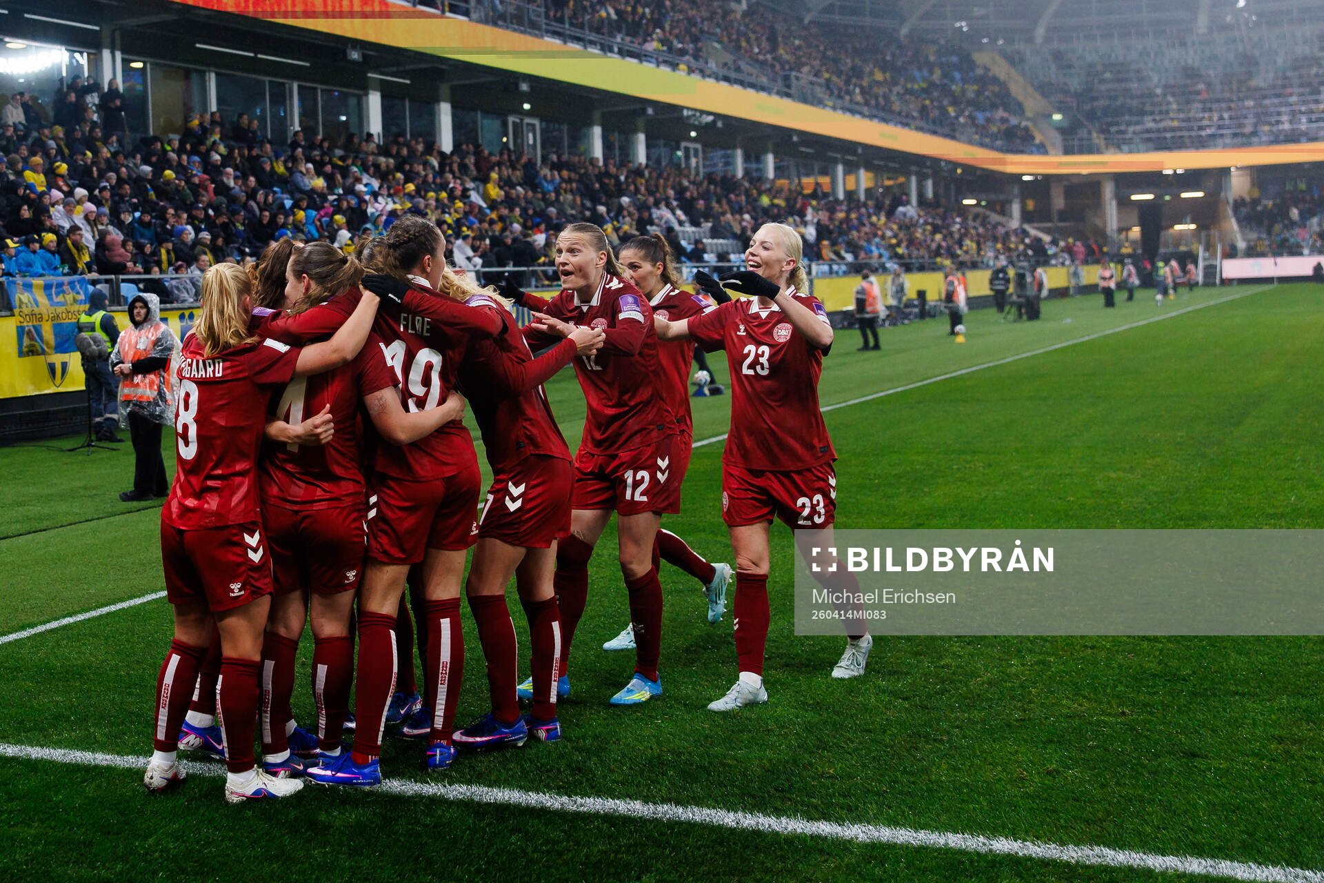 Janni Thomsen of Denmark celebrates with team mates