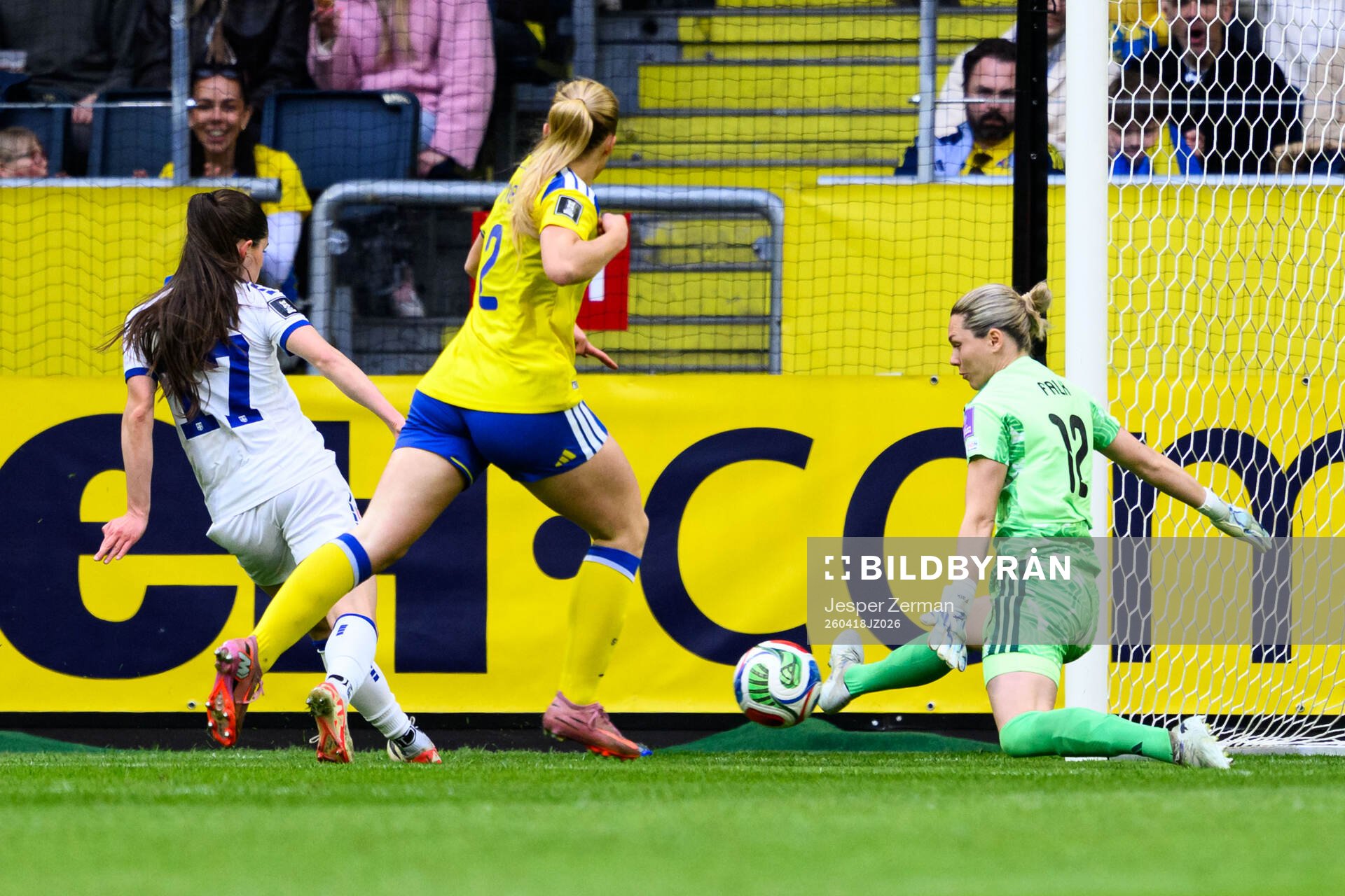 Sara Stokic of Serbia and goalkeeper Jennifer Falk of Sweden