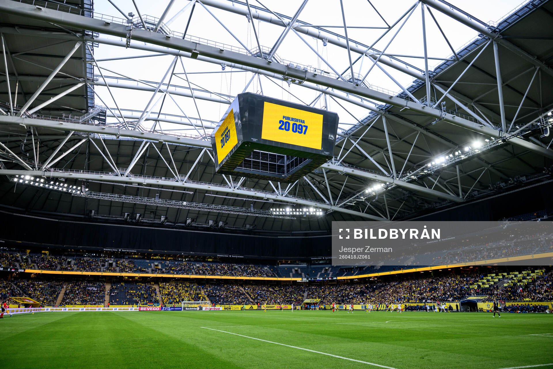 The Jumbotron shows the attendance