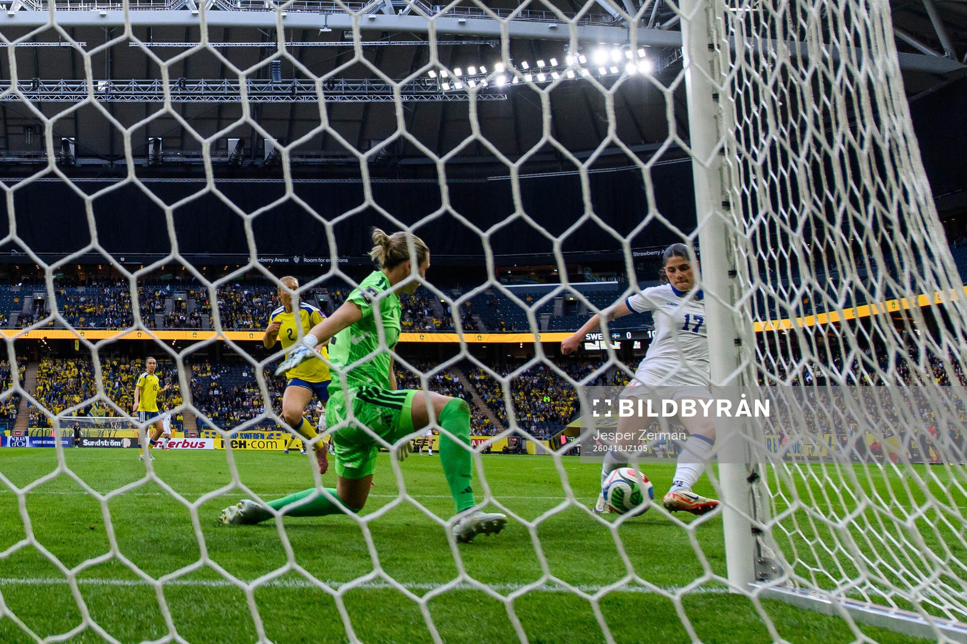 goalkeeper Jennifer Falk of Sweden and Sara Stokic of Serbia