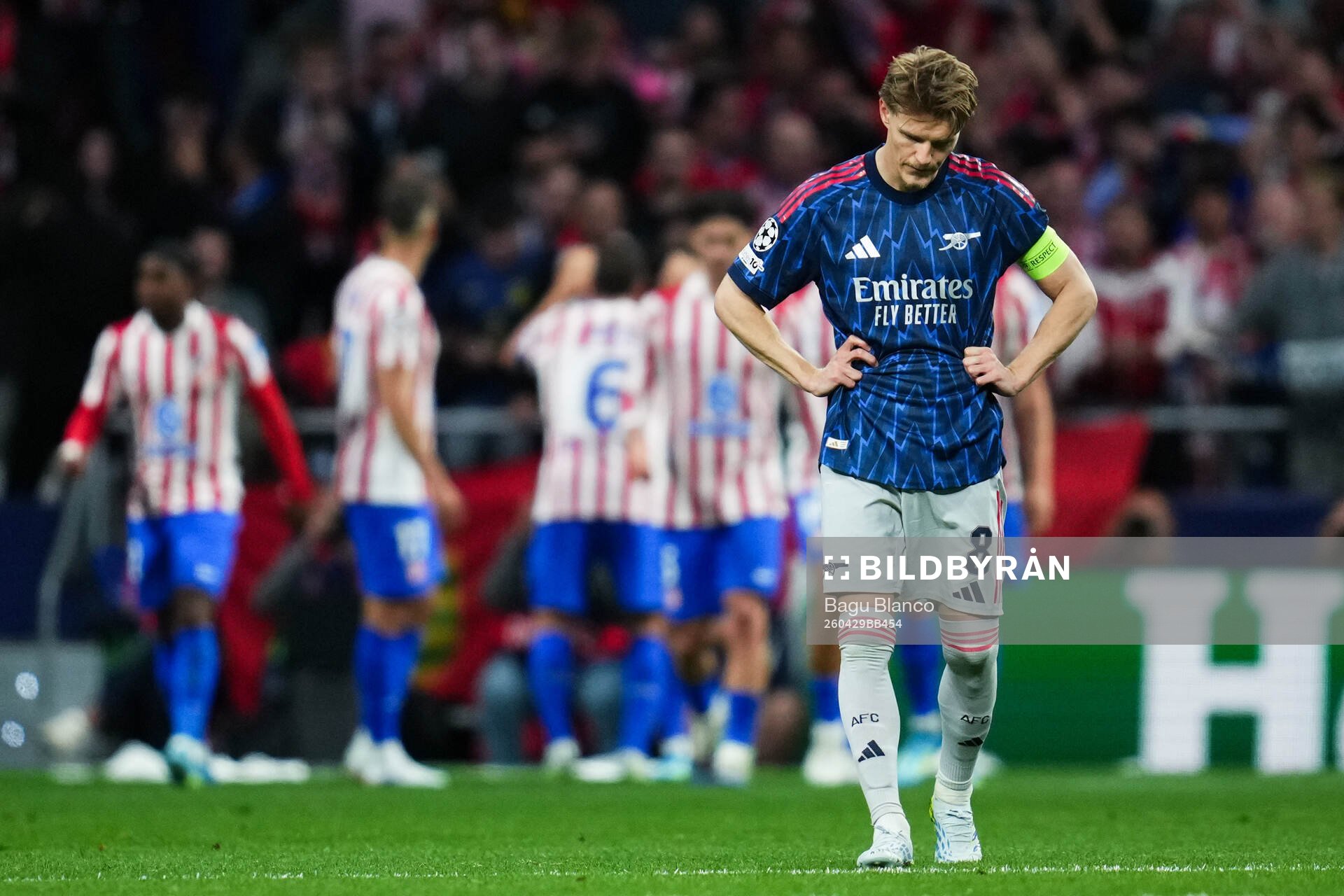 Martin Ødegaard of Arsenal looks dejected