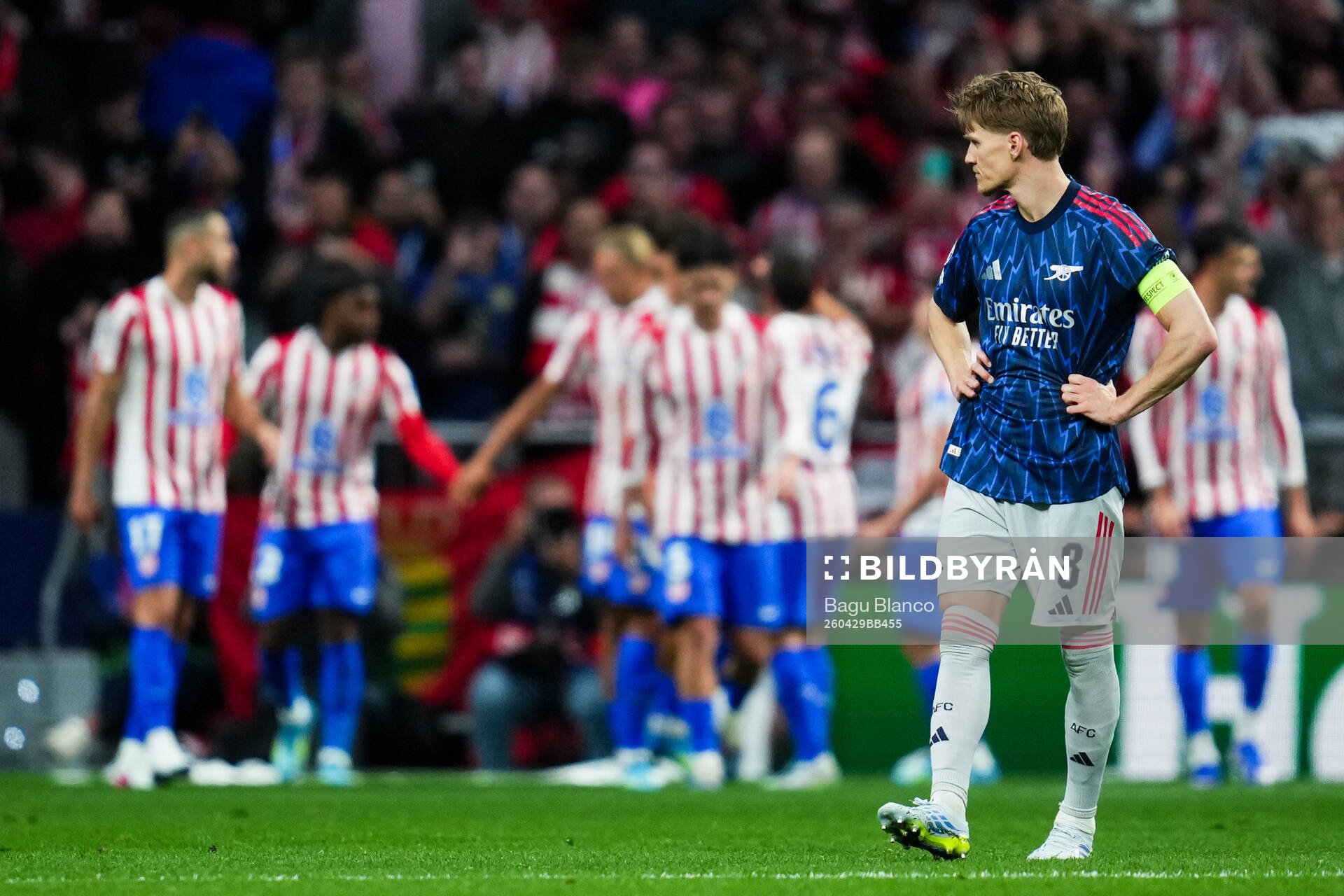 Martin Ødegaard of Arsenal looks dejected