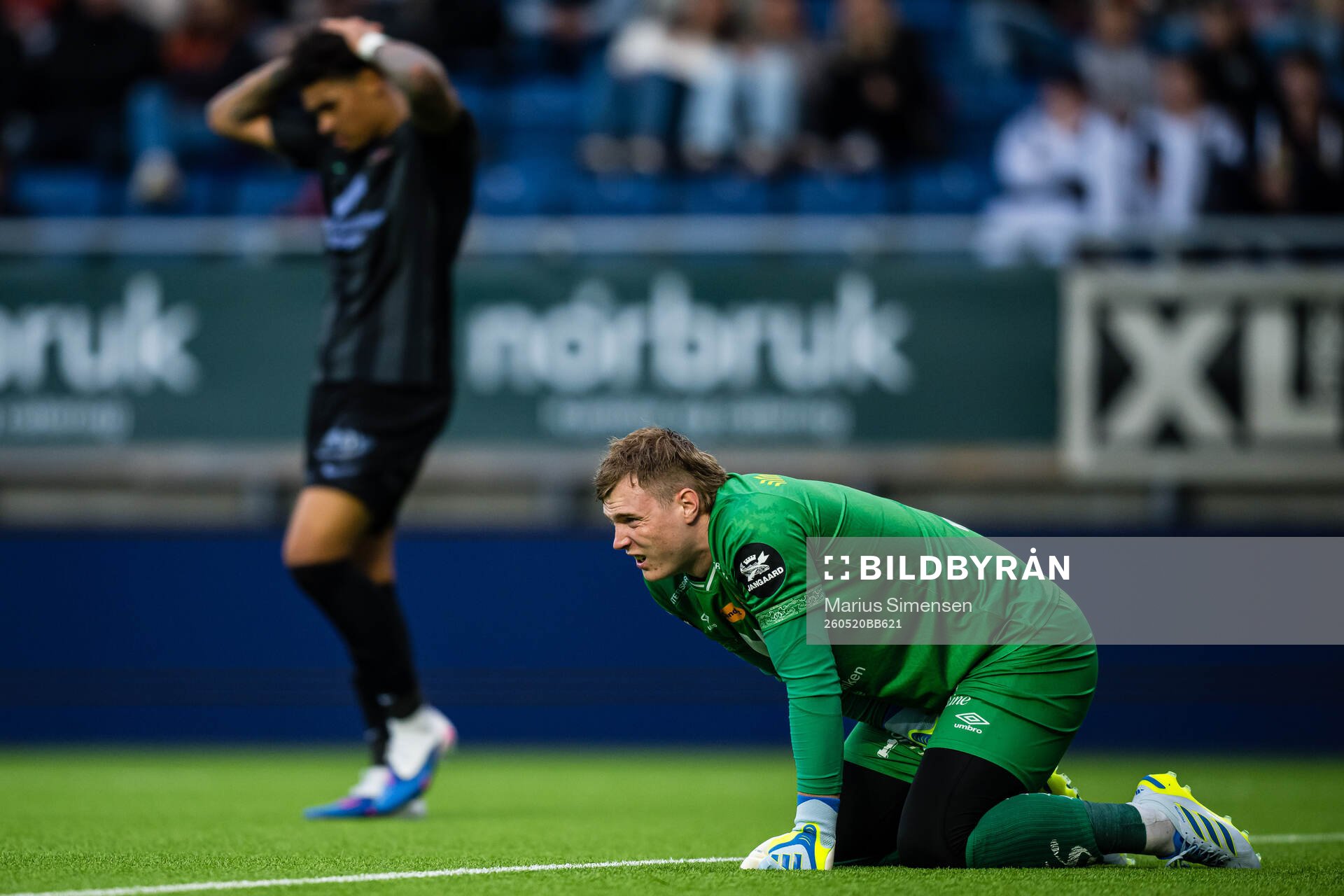 Goalkeeper Kristoffer Klaesson of Aalesund in pain