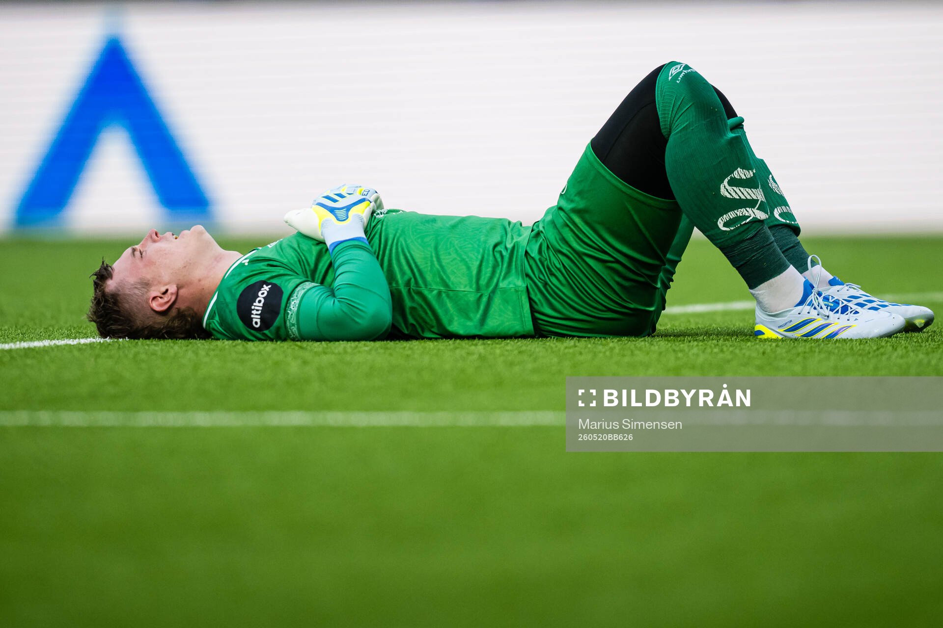 Goalkeeper Kristoffer Klaesson of Aalesund in pain
