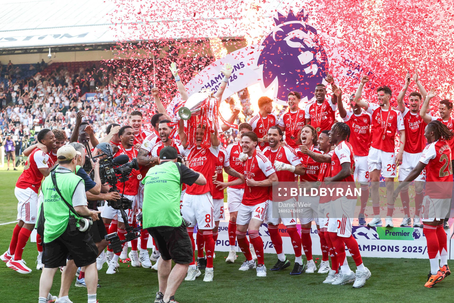 Martin Ødegaard of Arsenal celebrates with the trophy for