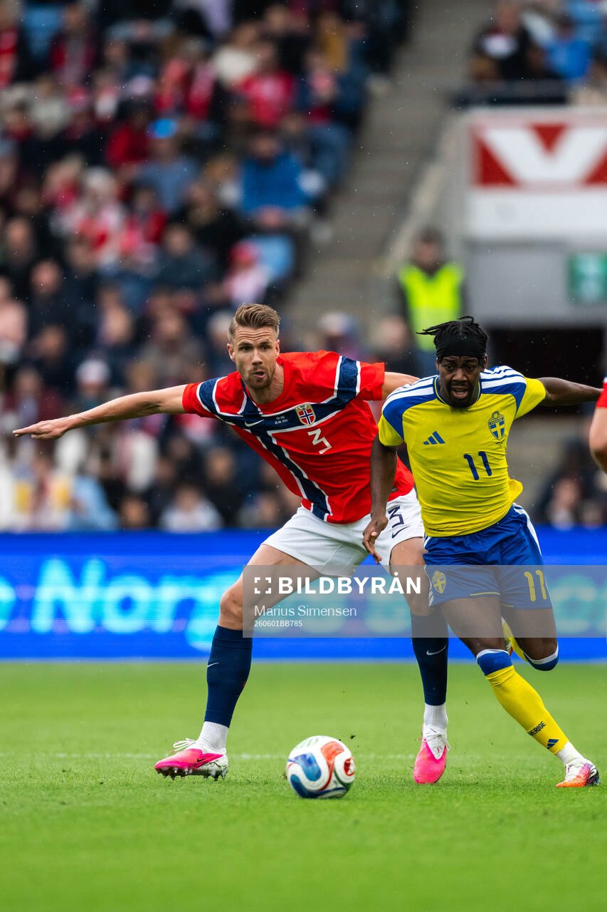 Kristoffer Ajer of Norway and Anthony Elanga of Sweden