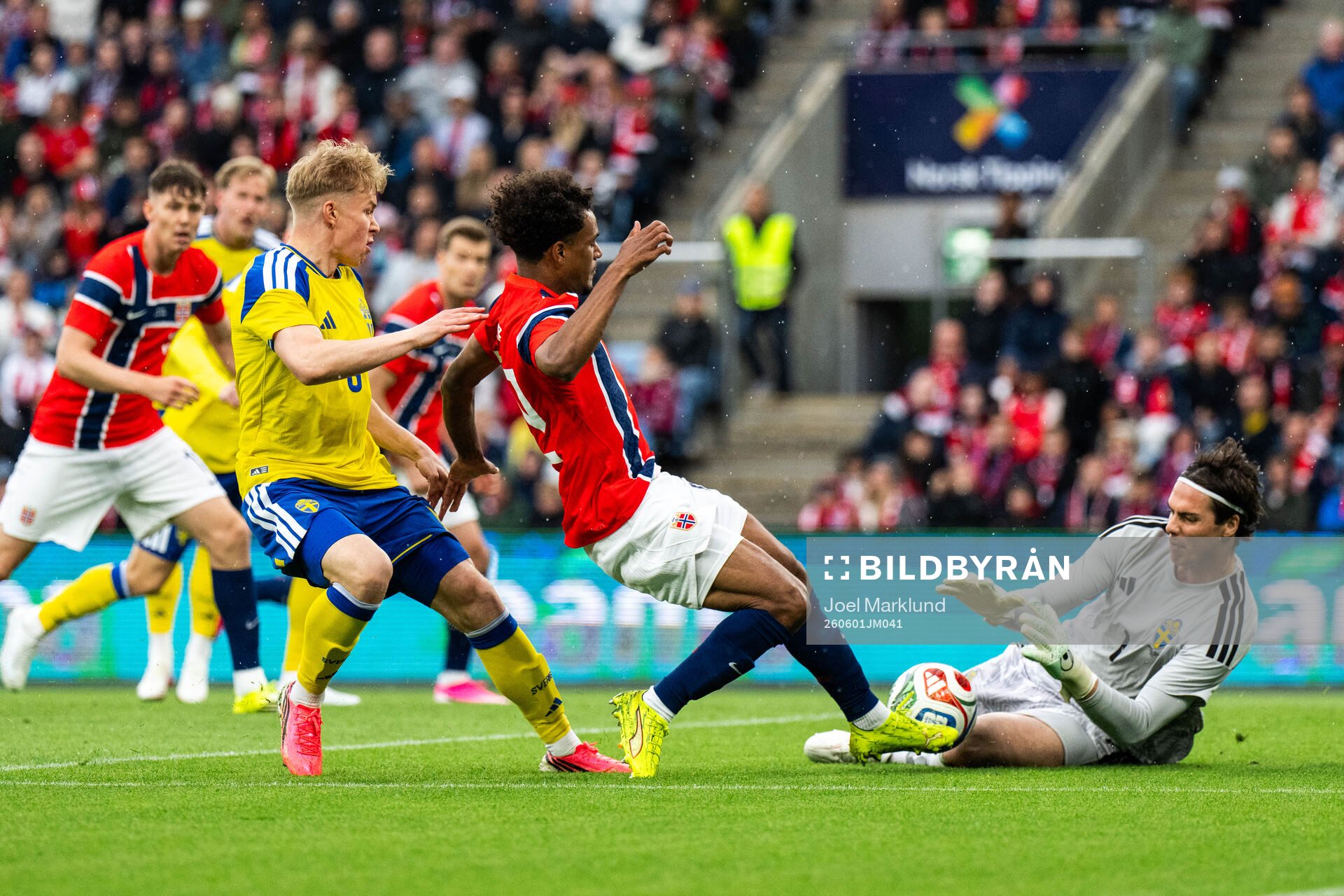 Daniel Svensson and goalkeeper Jacob Widell Zetterström of