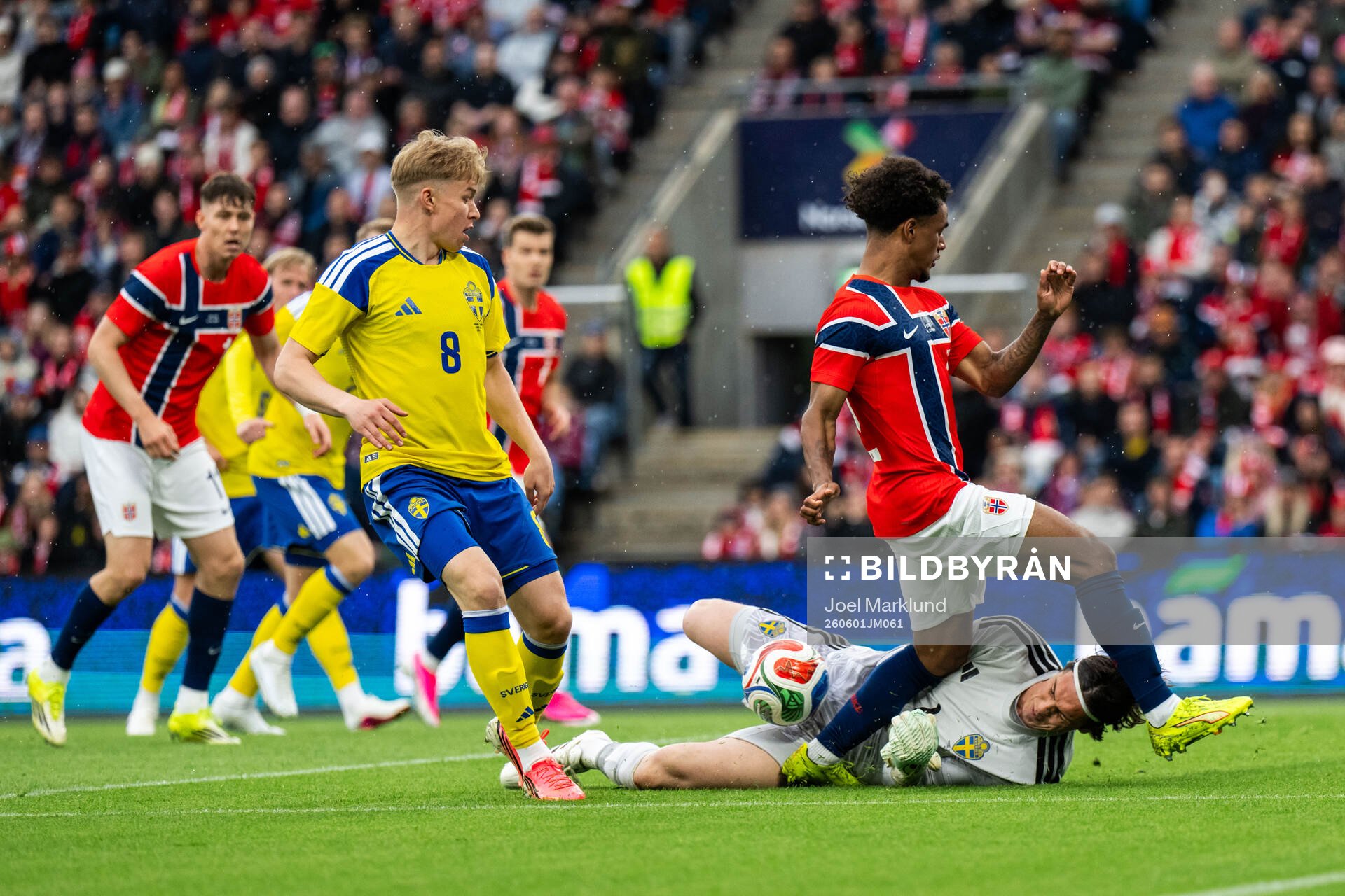Daniel Svensson and goalkeeper Jacob Widell Zetterström of