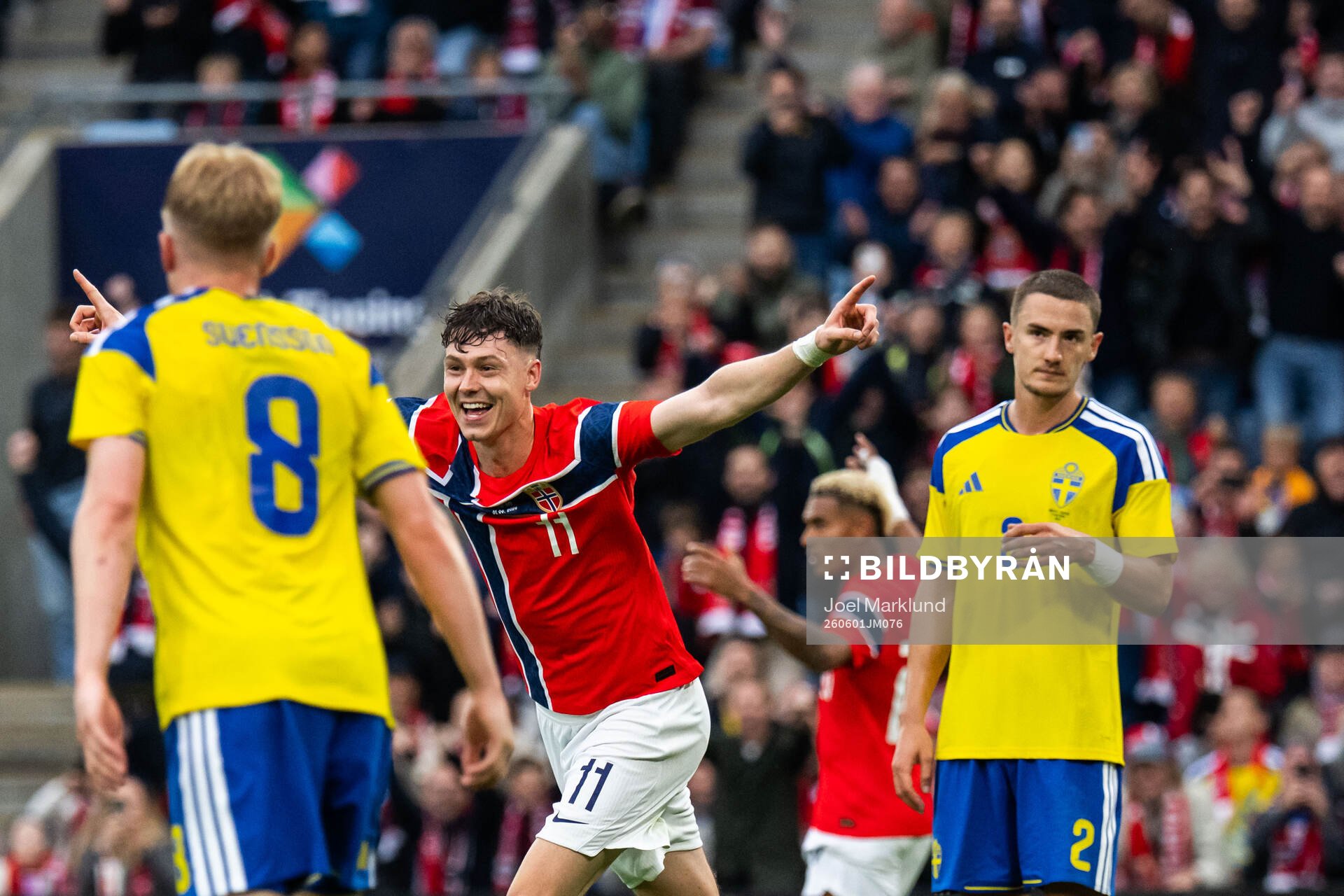Jørgen Strand Larsen of Norway celebrates while Daniel