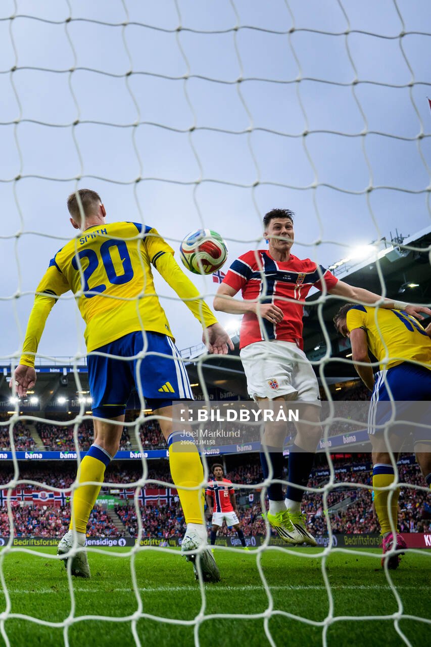 Eric Smith of Sweden touches the ball as Jørgen Strand