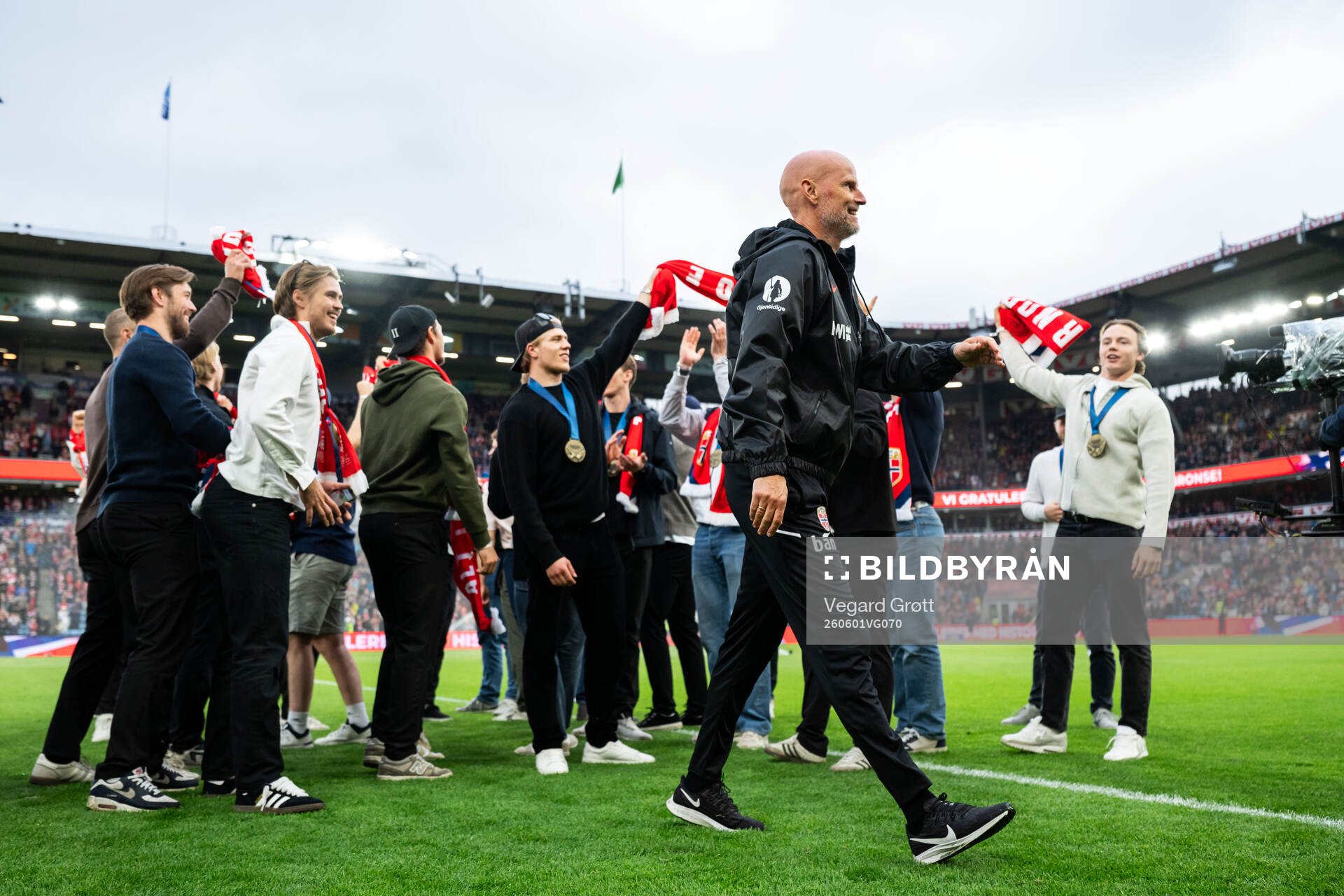 Players of the Norwegian national ice hockey team celebrate