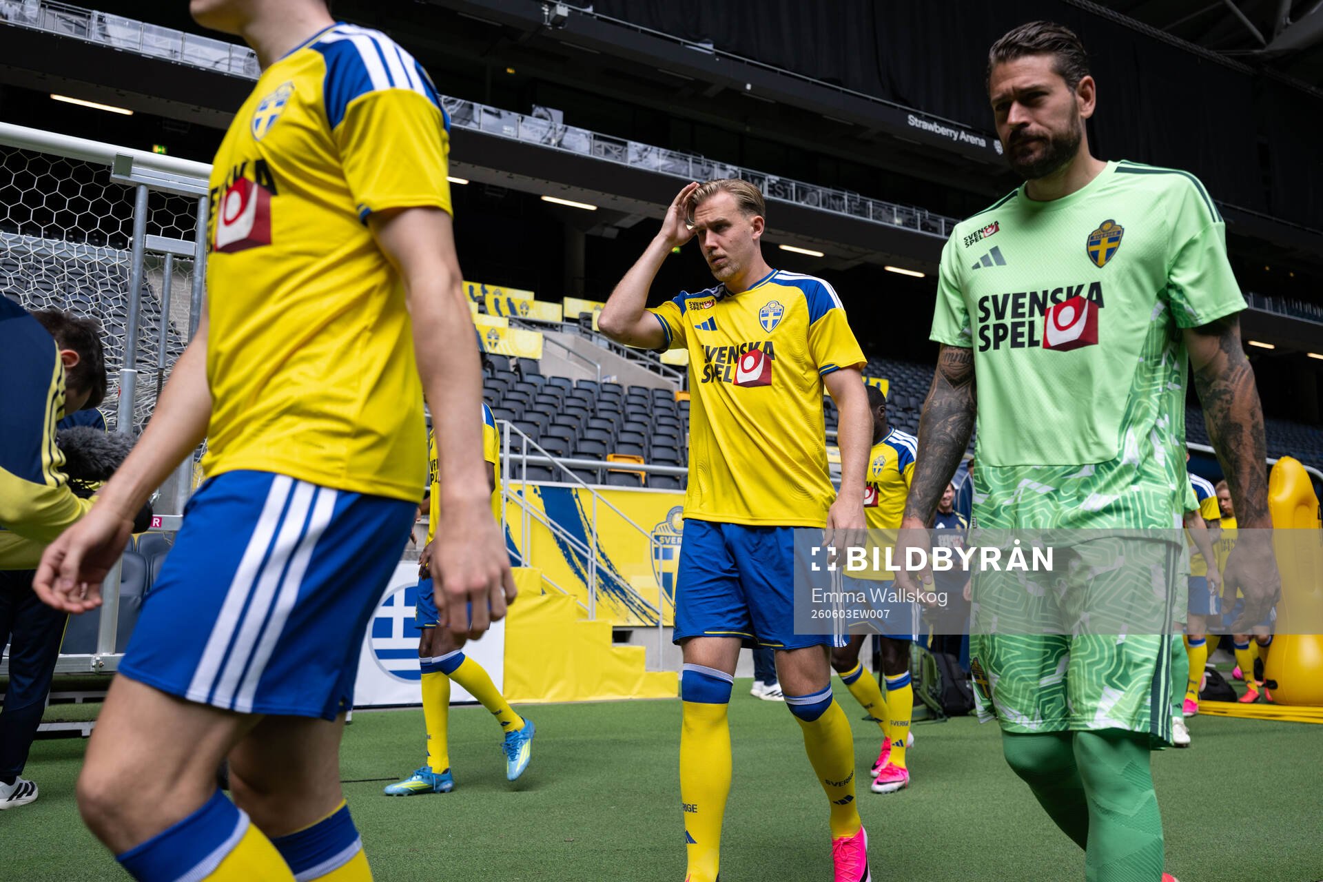 Herman Johansson and goalkeeper Kristoffer Nordfeldt of the