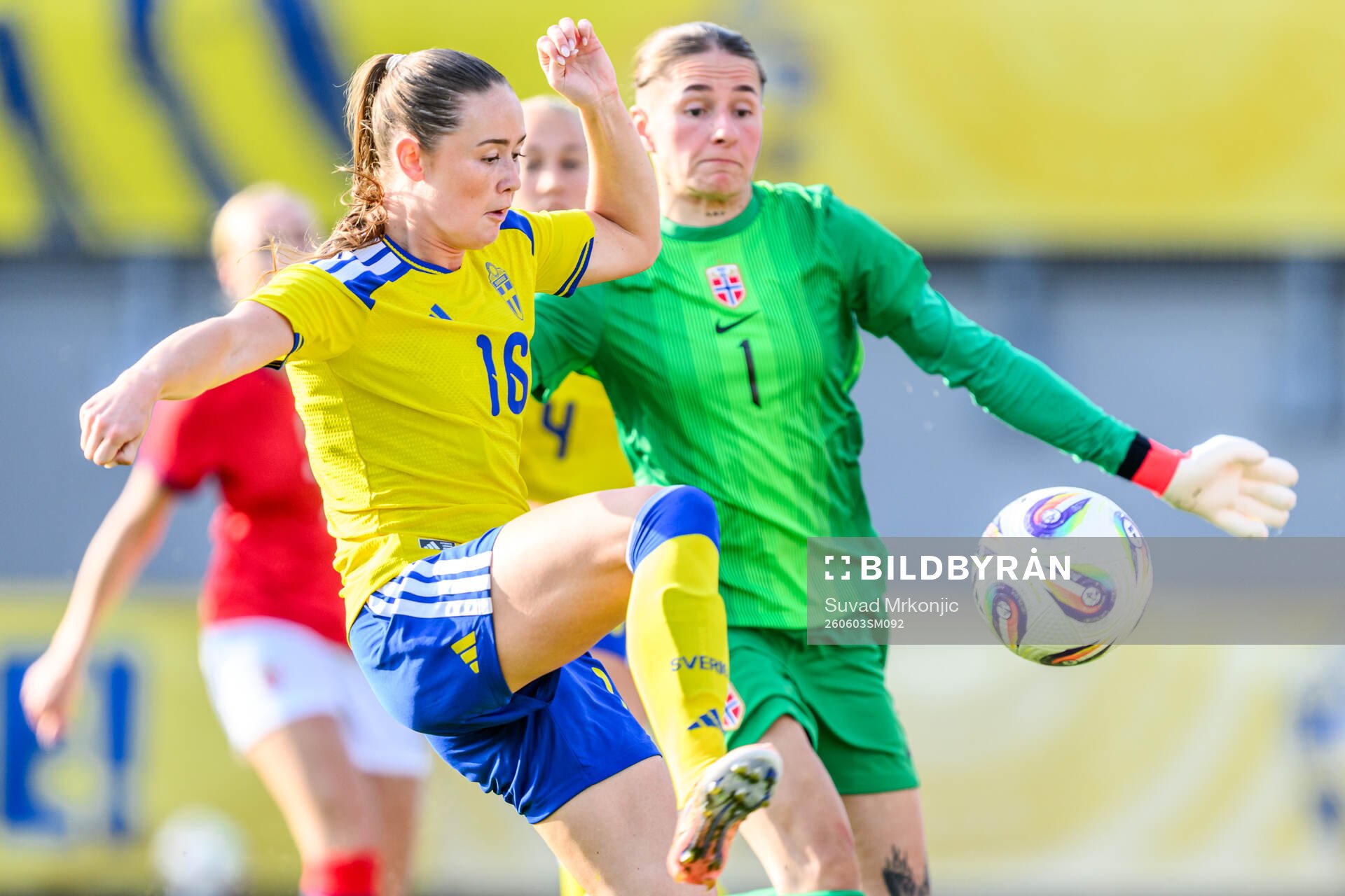 Svea Rehnberg of Sweden and goalkeeper Thiril Erichsen of
