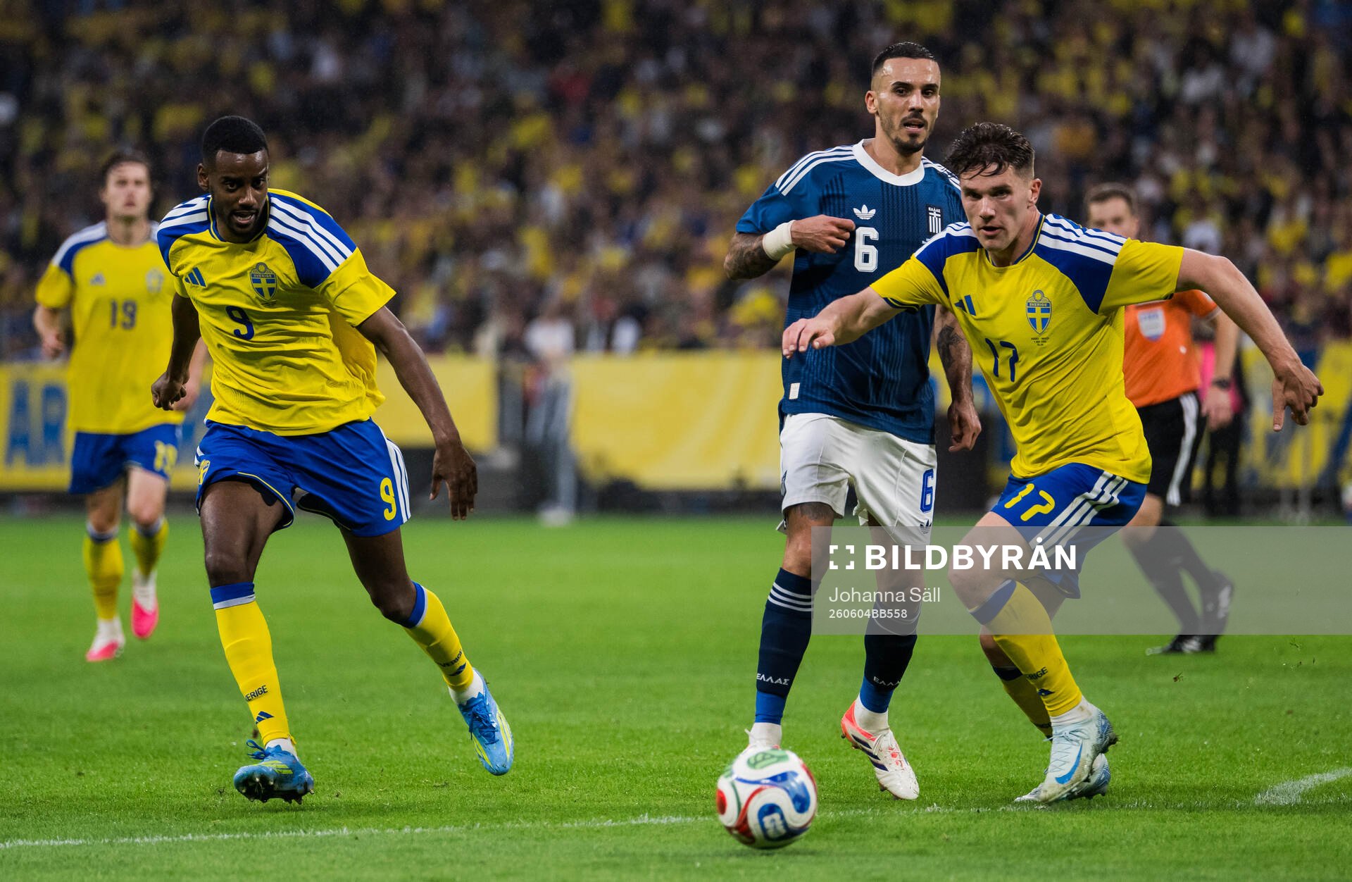 Alexander Isak and Viktor Gyökeres of Sweden compete for