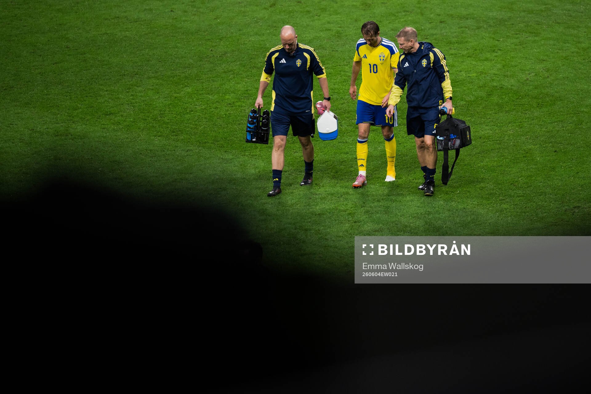 Benjamin Nygren of Sweden leaves the pitch due to injury
