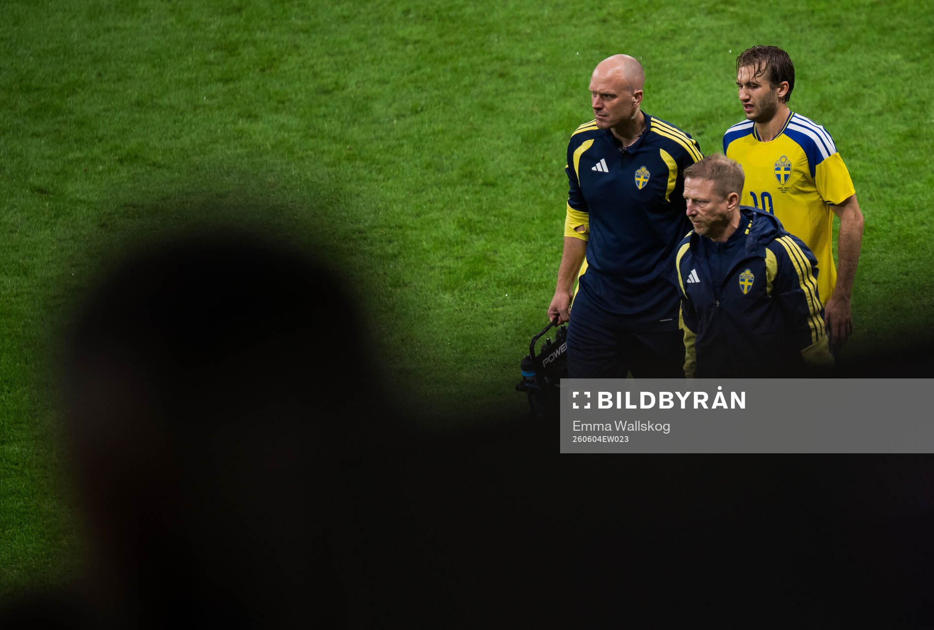 Benjamin Nygren of Sweden leaves the pitch due to injury