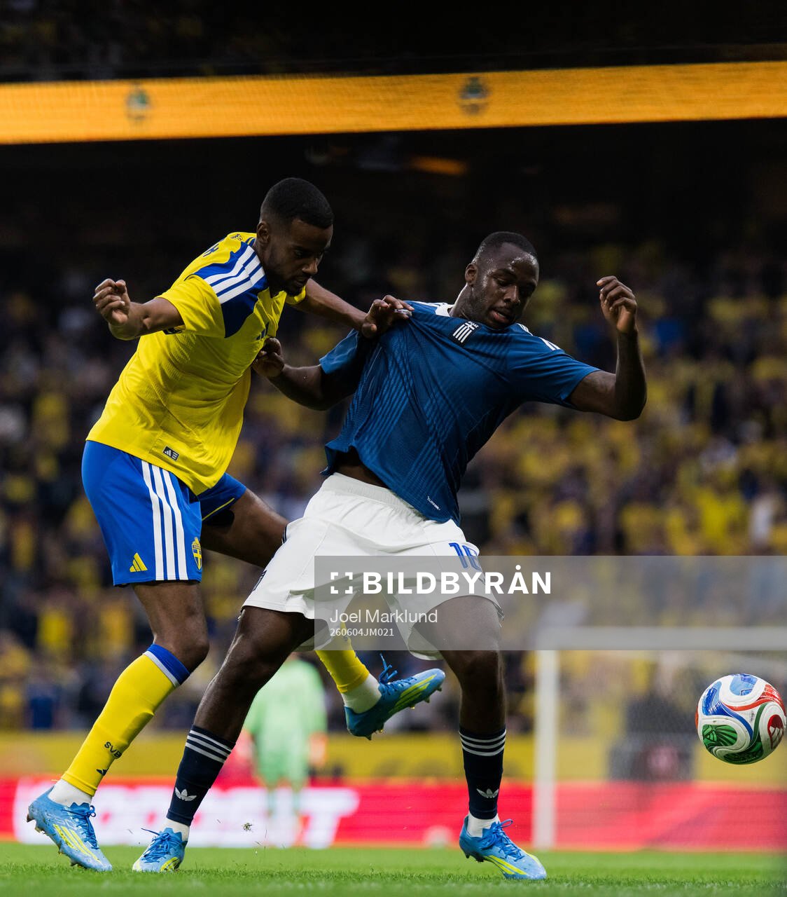 Alexander Isak of Sweden and Andreas Tetteh of Greece