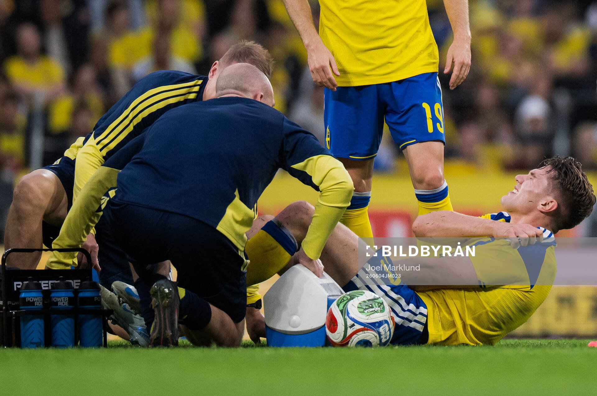 Viktor Gyökeres of Sweden receives medical attention
