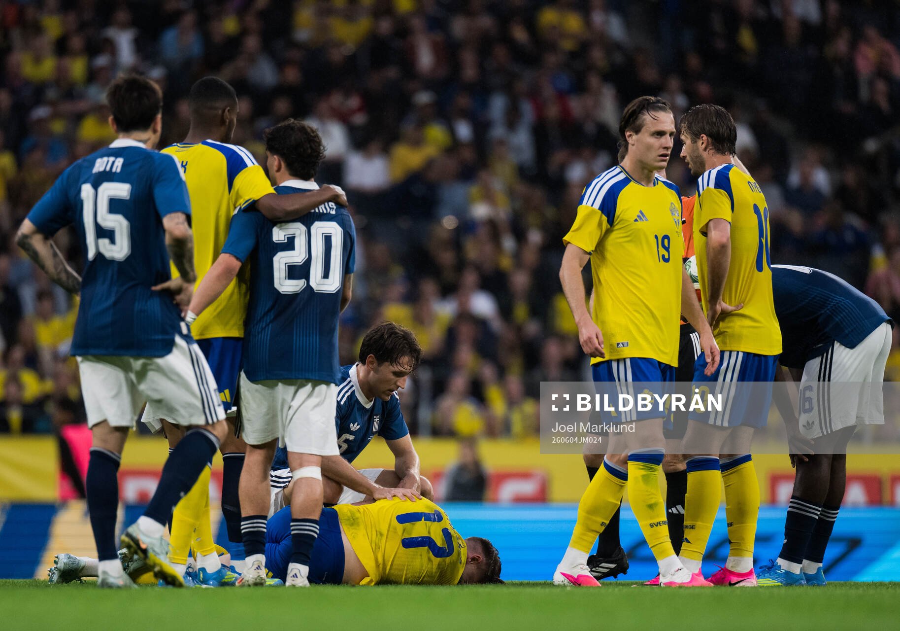 Panagiotis Retsos of Greece with Viktor Gyökeres of Sweden