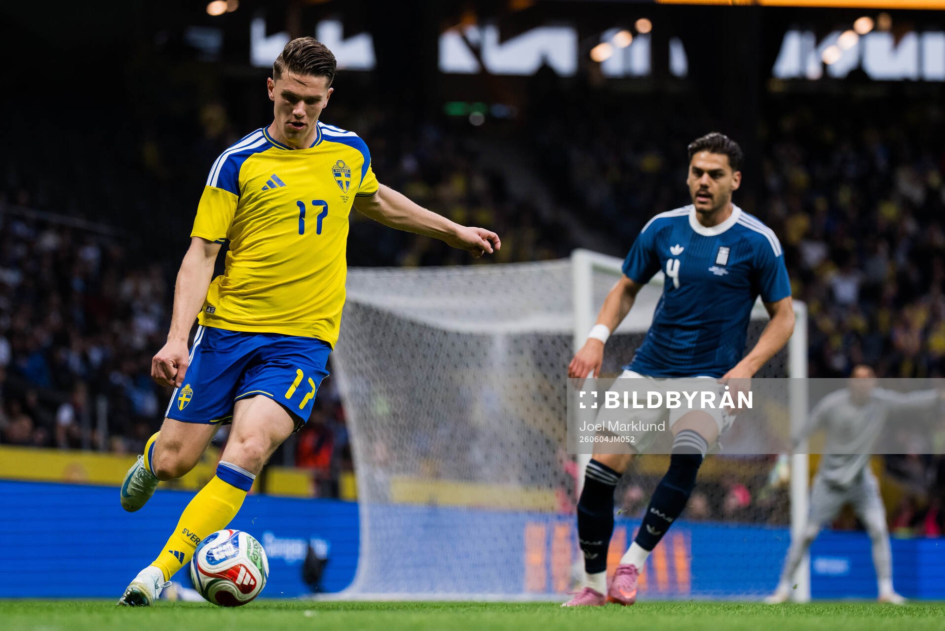 Viktor Gyökeres of Sweden and Ntinos Mavropanos of Greece