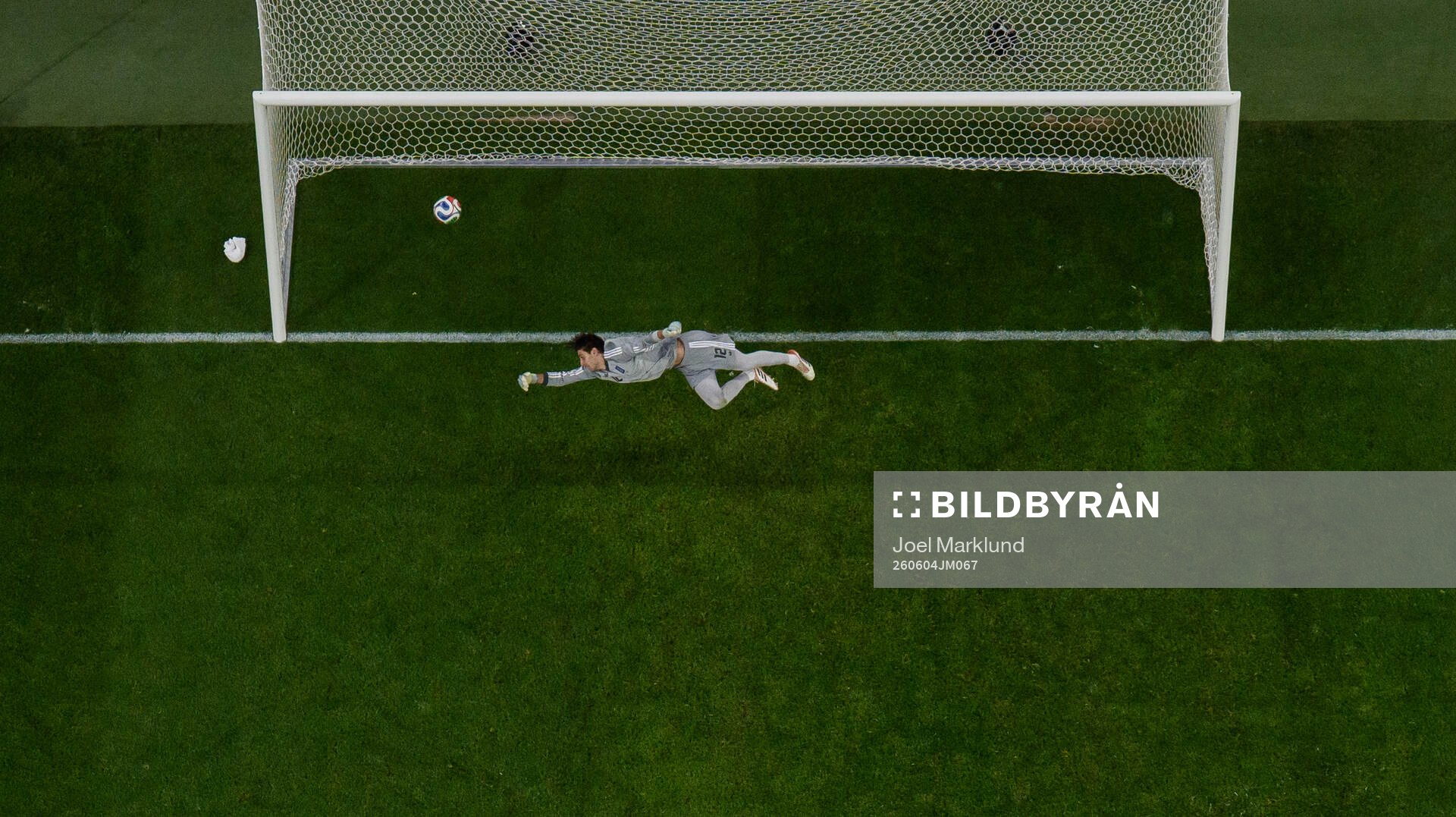 Viktor Gyökeres of Sweden (not pictured) scores 1-1 past