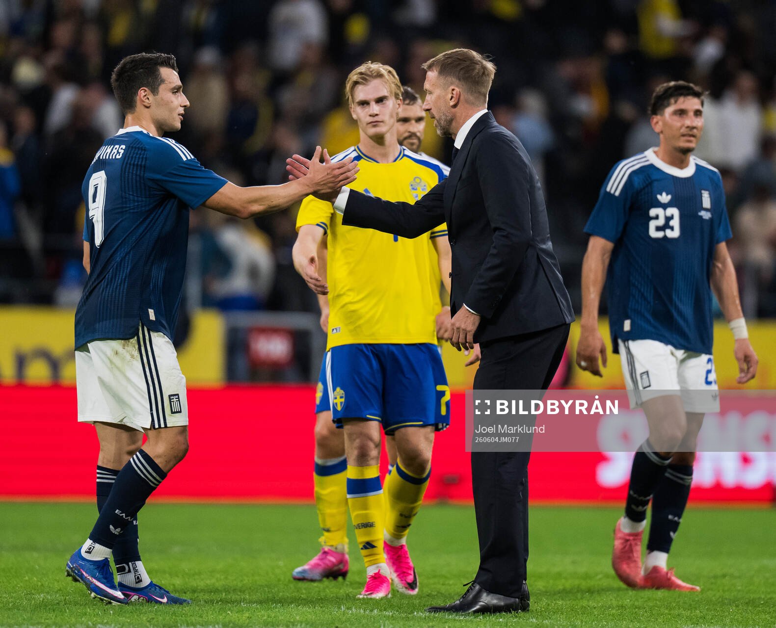 Tasos Douvikas of Greece and Head coach Graham Potter of