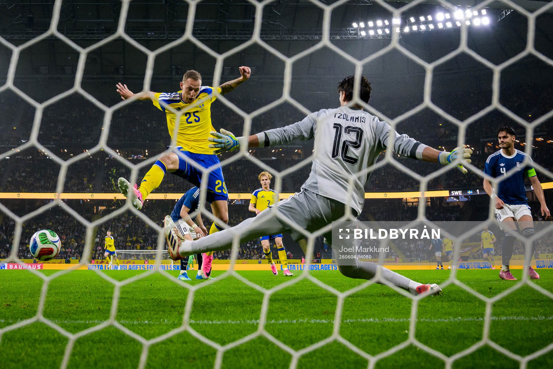 Gustaf Nilsson of Sweden scores the 2-1 goal behind
