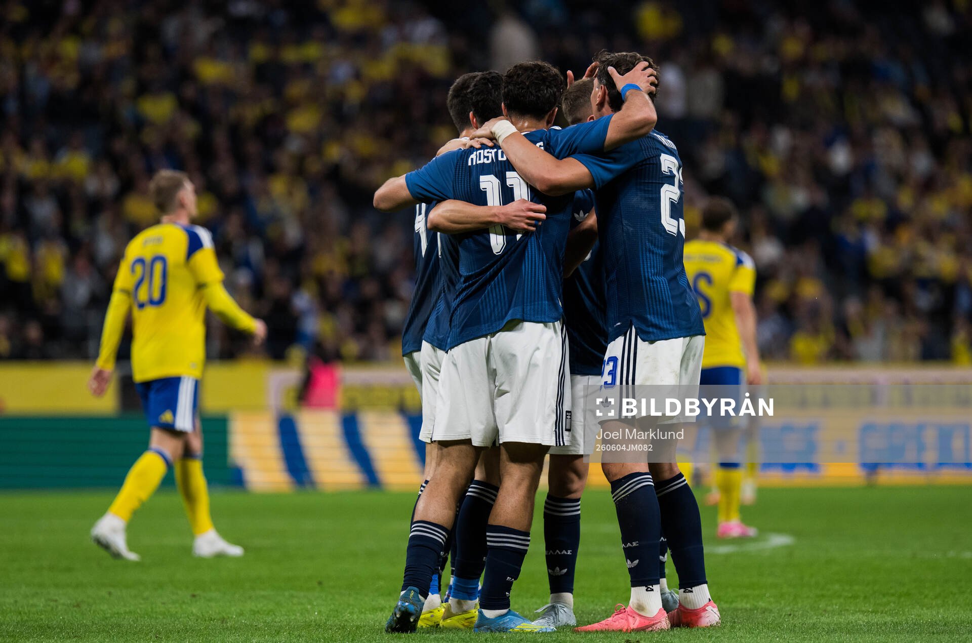 Giorgos Masouras of Greece celebrates with team mates
