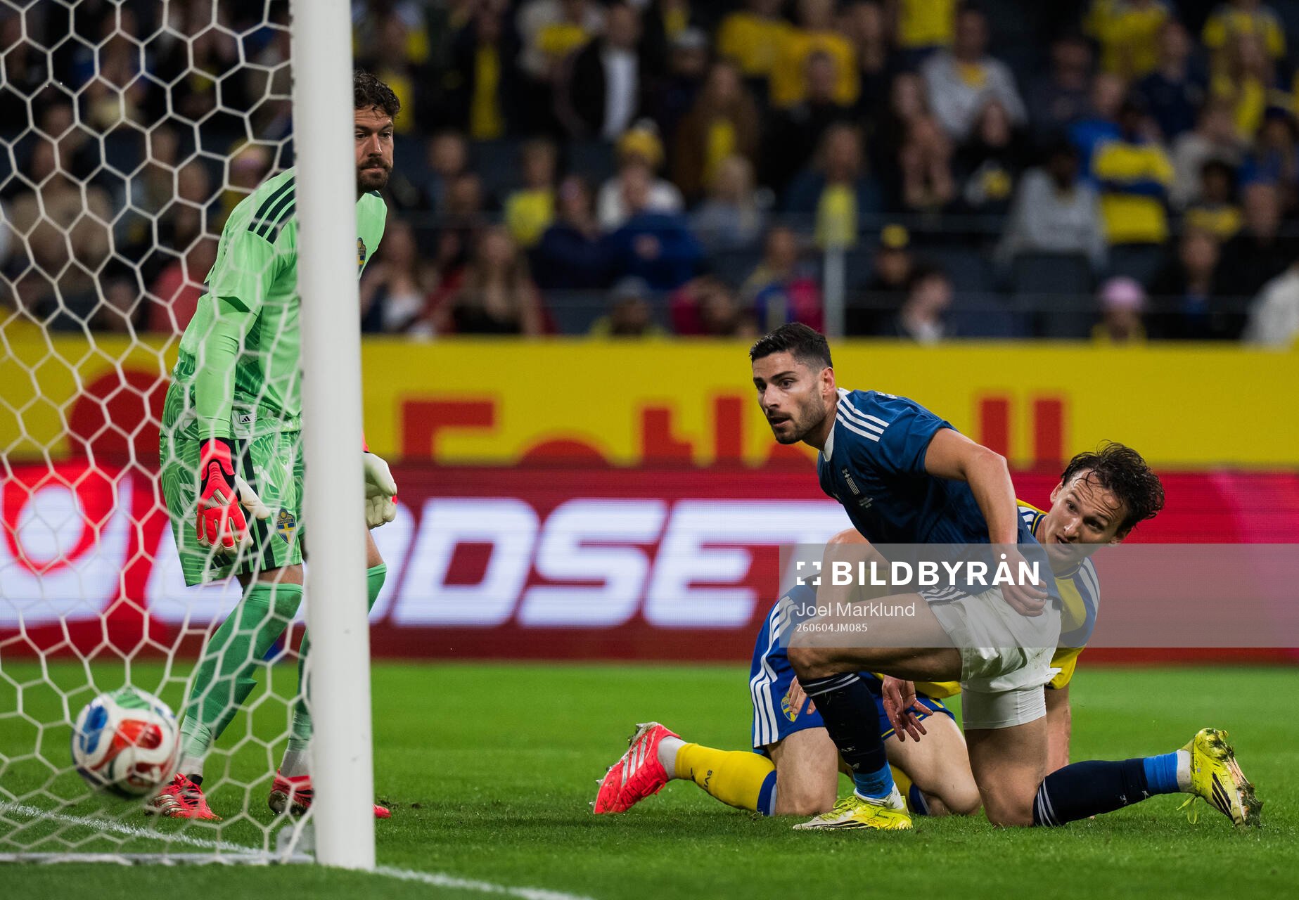 Goalkeeper Kristoffer Nordfeldt and Hjalmar Ekdal of Sweden