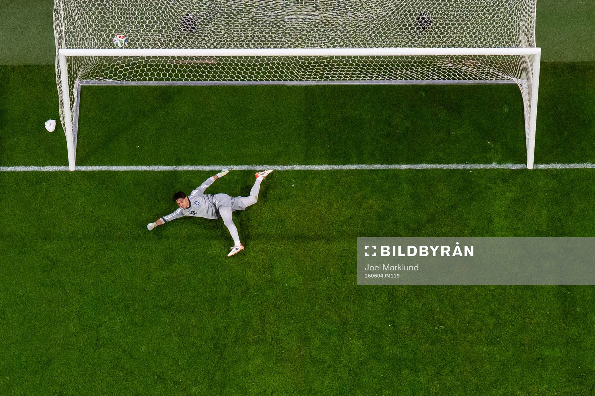 Goalkeeper Kostas Tzolakis of Greece lets in the 1-1 goal