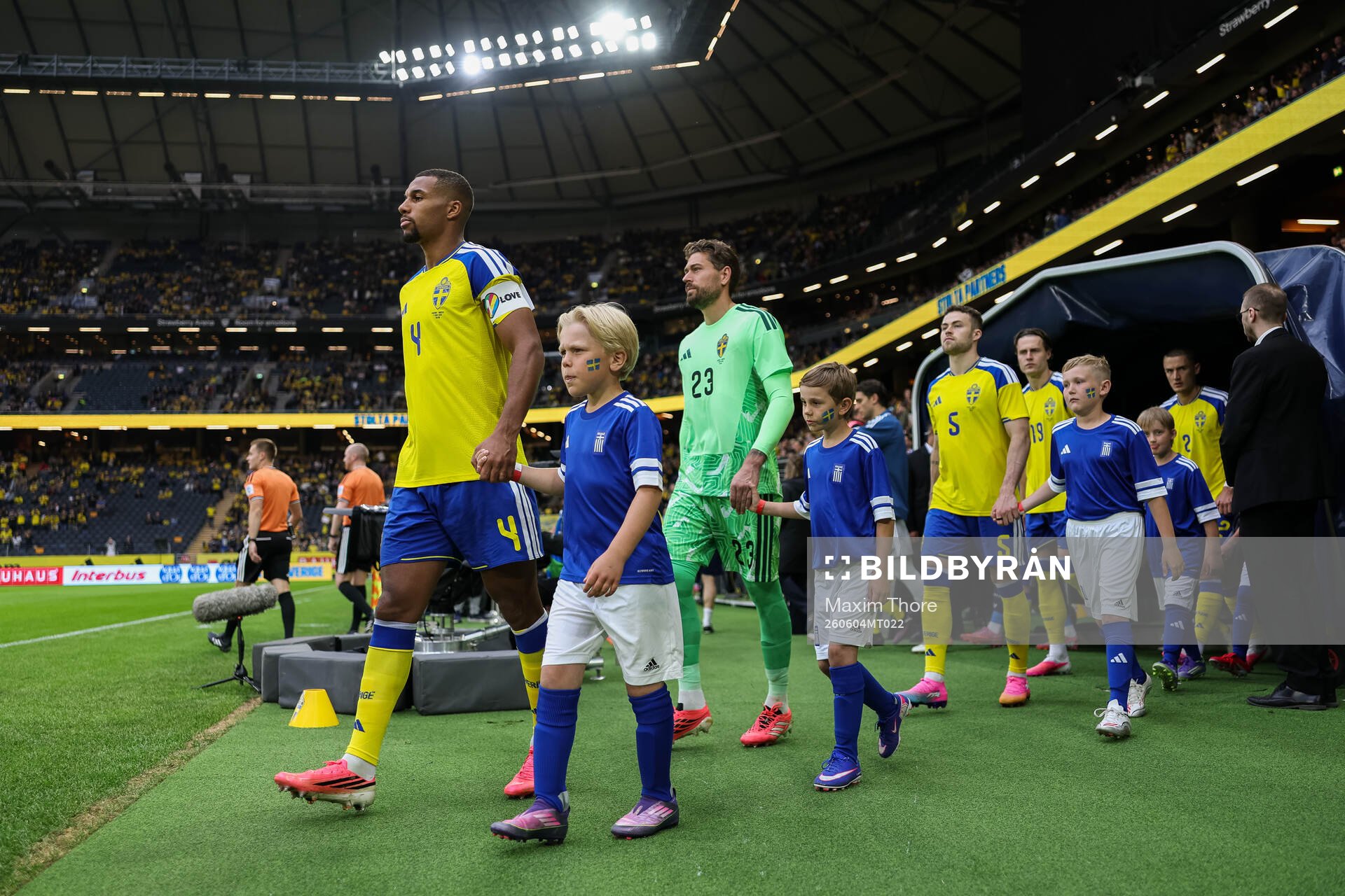 Isak Hien and goalkeeper Kristoffer Nordfeldt of Sweden
