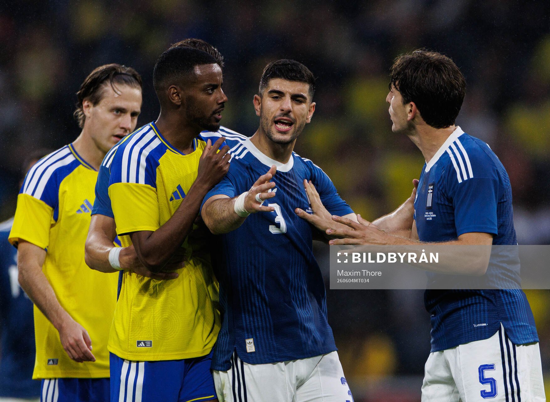 Alexander Isak of Sweden reacts at Tasos Douvikas and