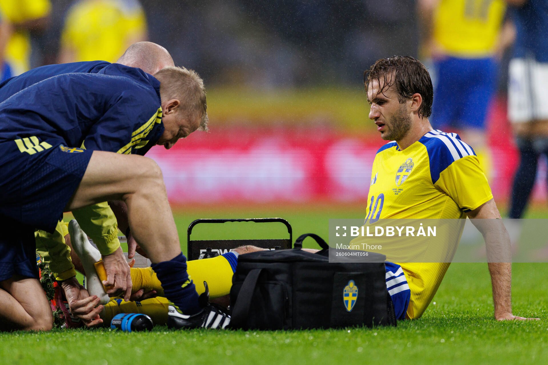 Benjamin Nygren of Sweden receives medical attention