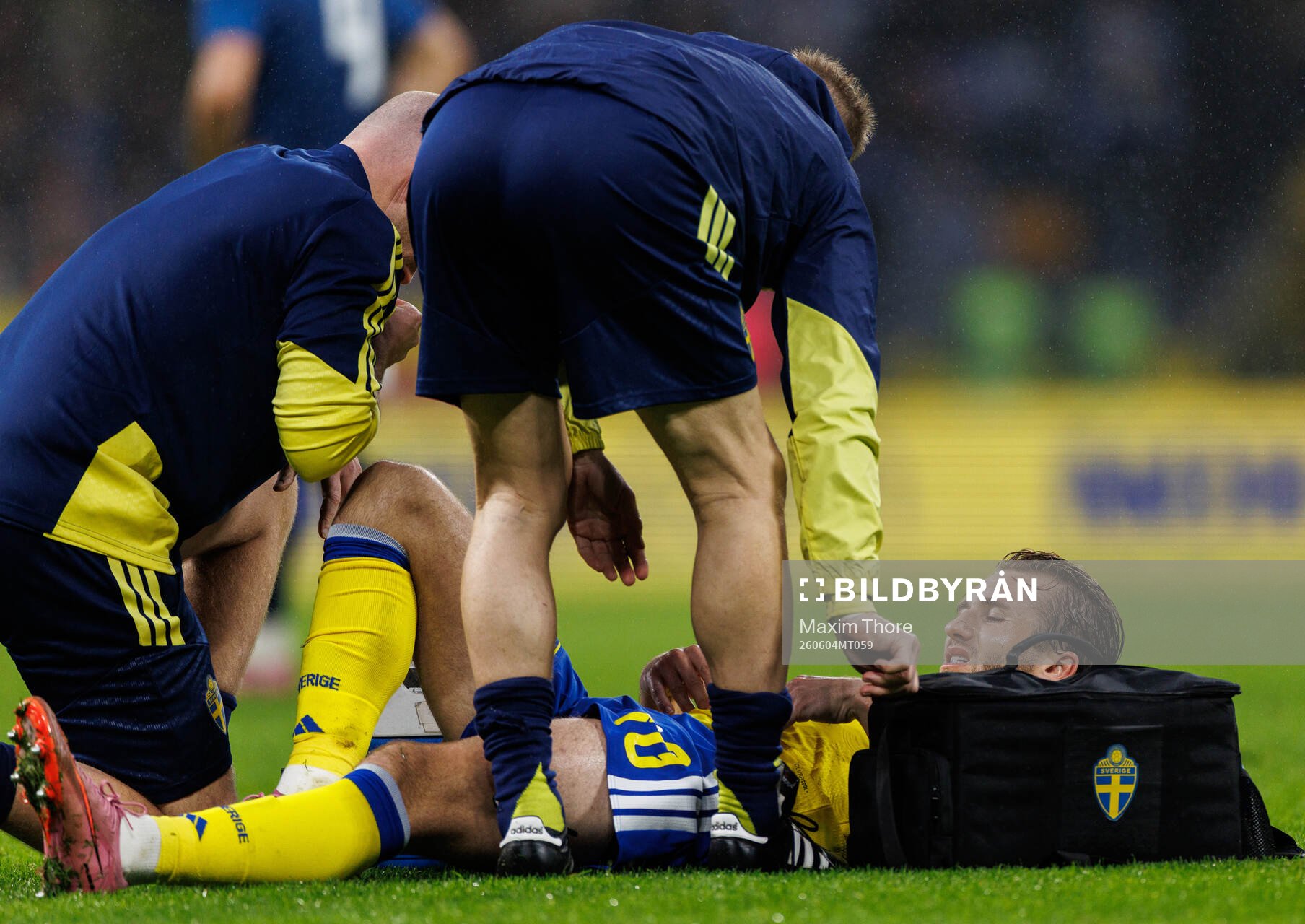 Benjamin Nygren of Sweden receives medical attention