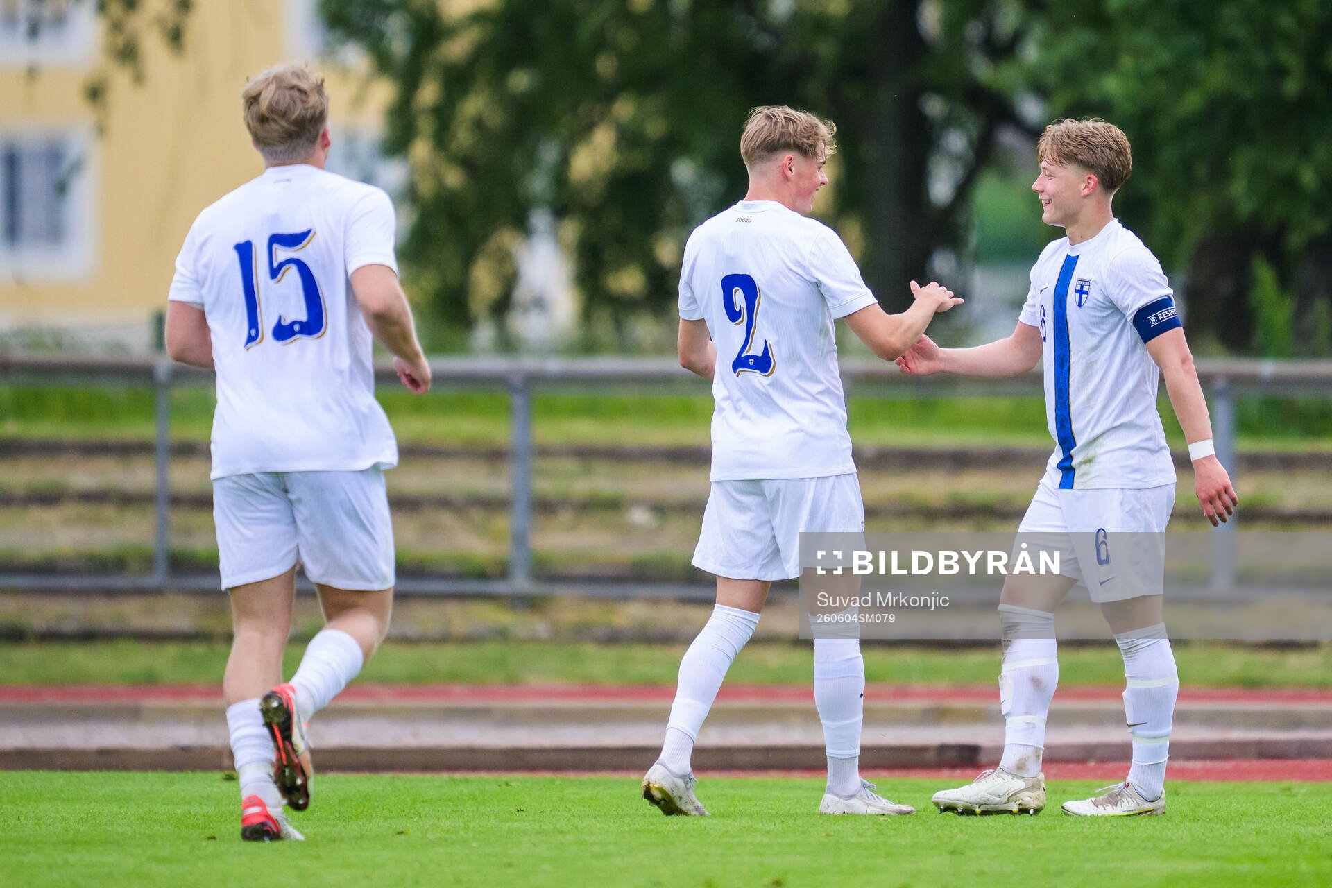 Akseli Puukko and Matias Siltanen of Finland celebrates