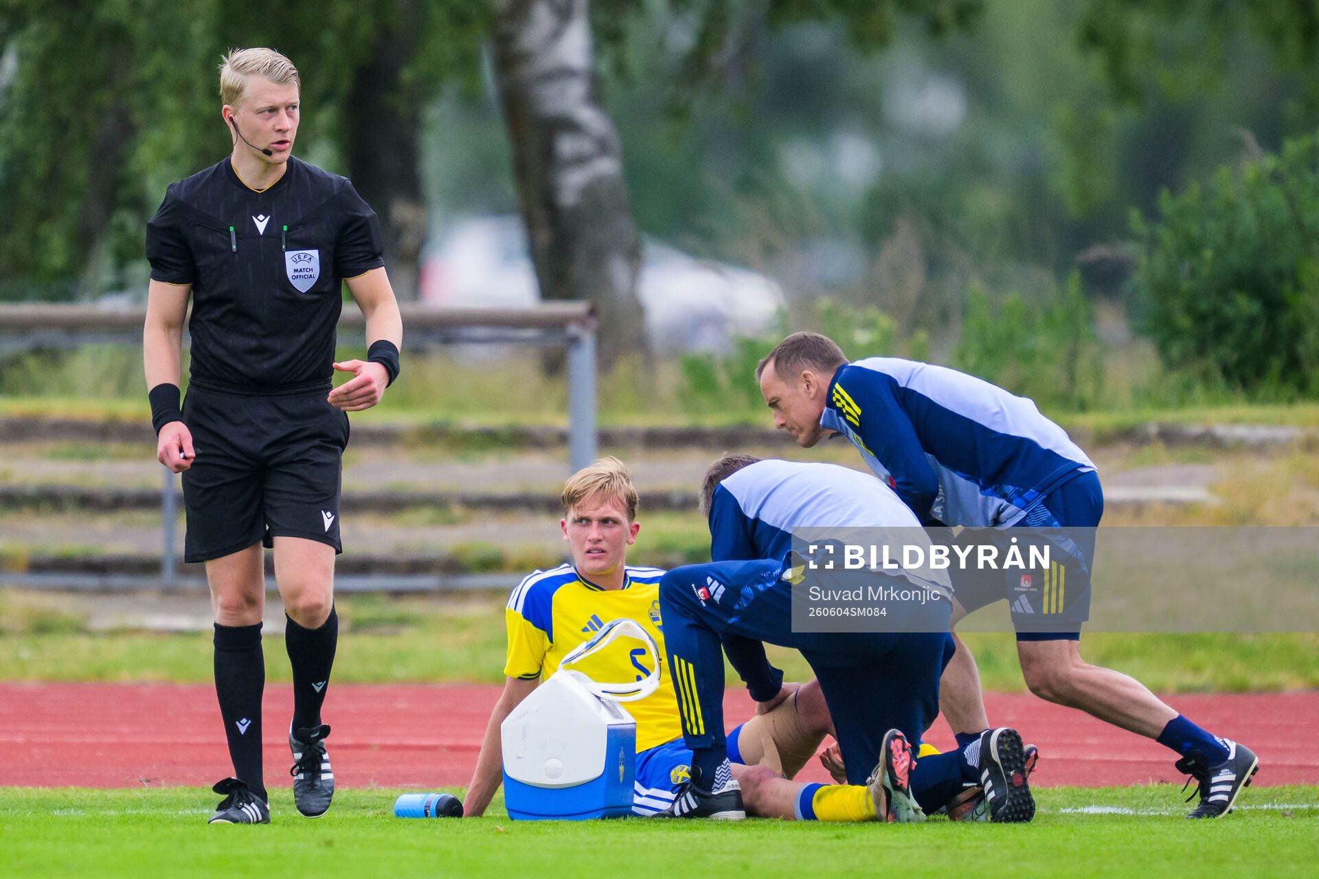 Olle Samuelsson of Sweden receives medical attention by