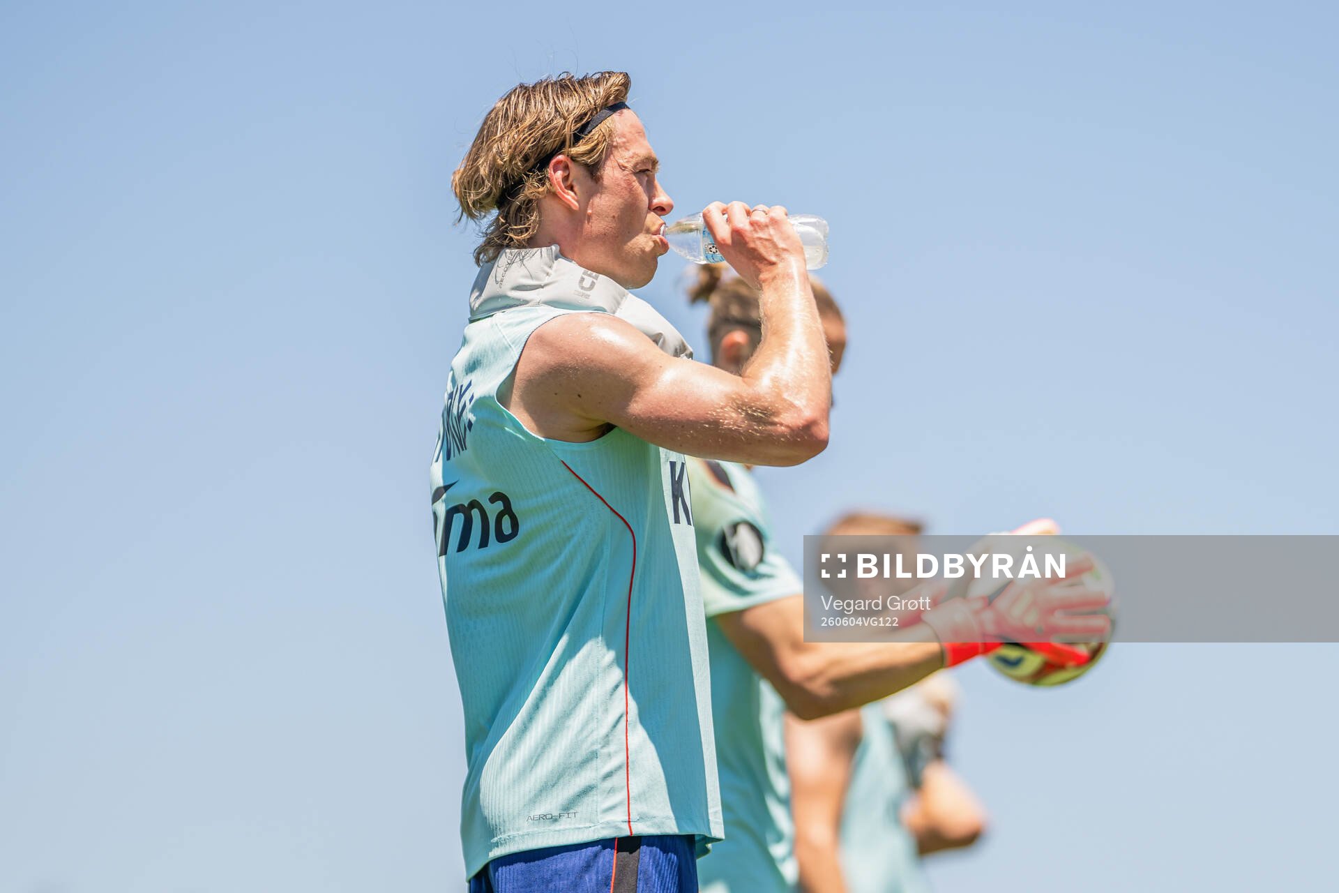 Patrick Berg of the Norwegian national football team drinks