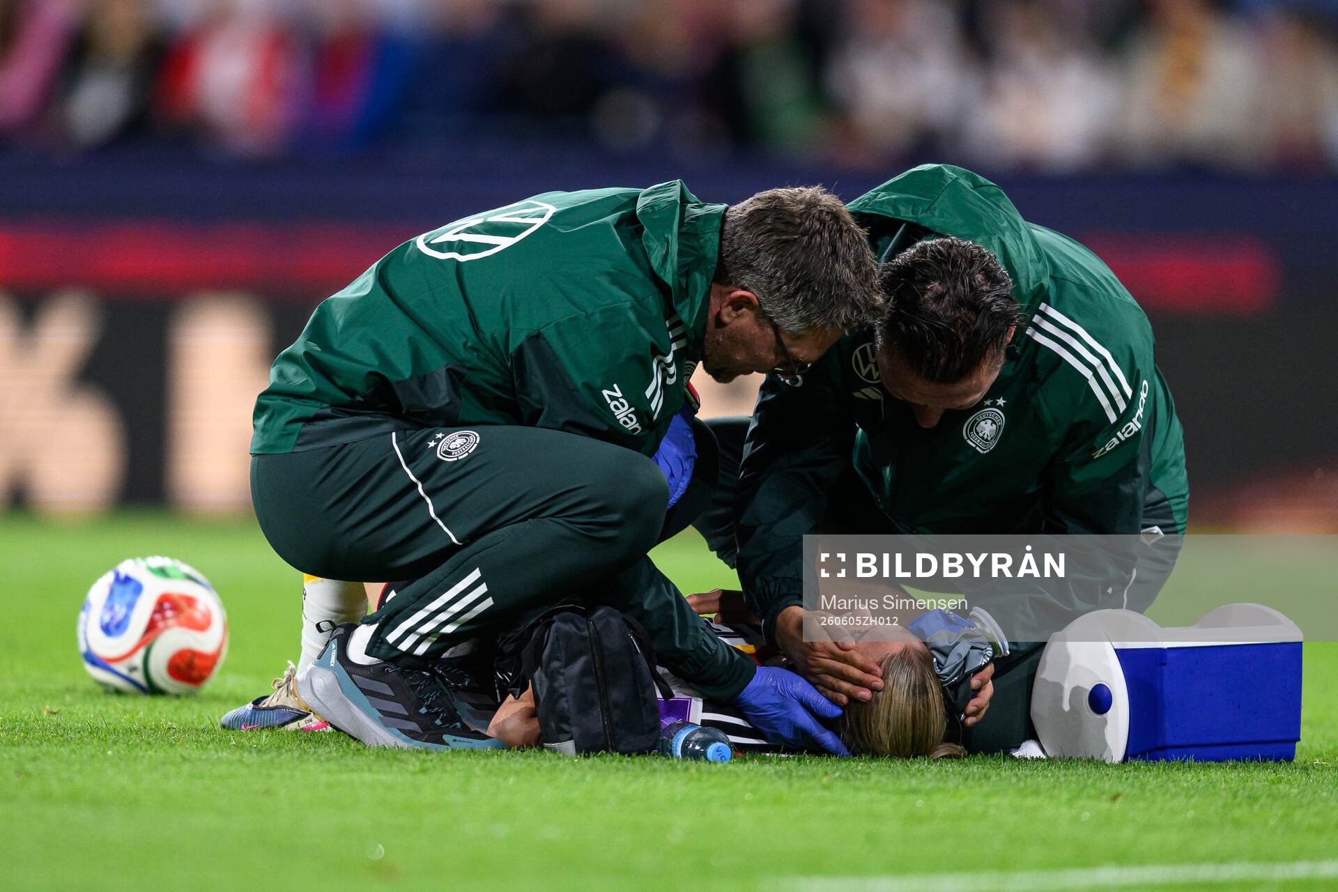 Elisa Senß of Germany in pain and receives medical