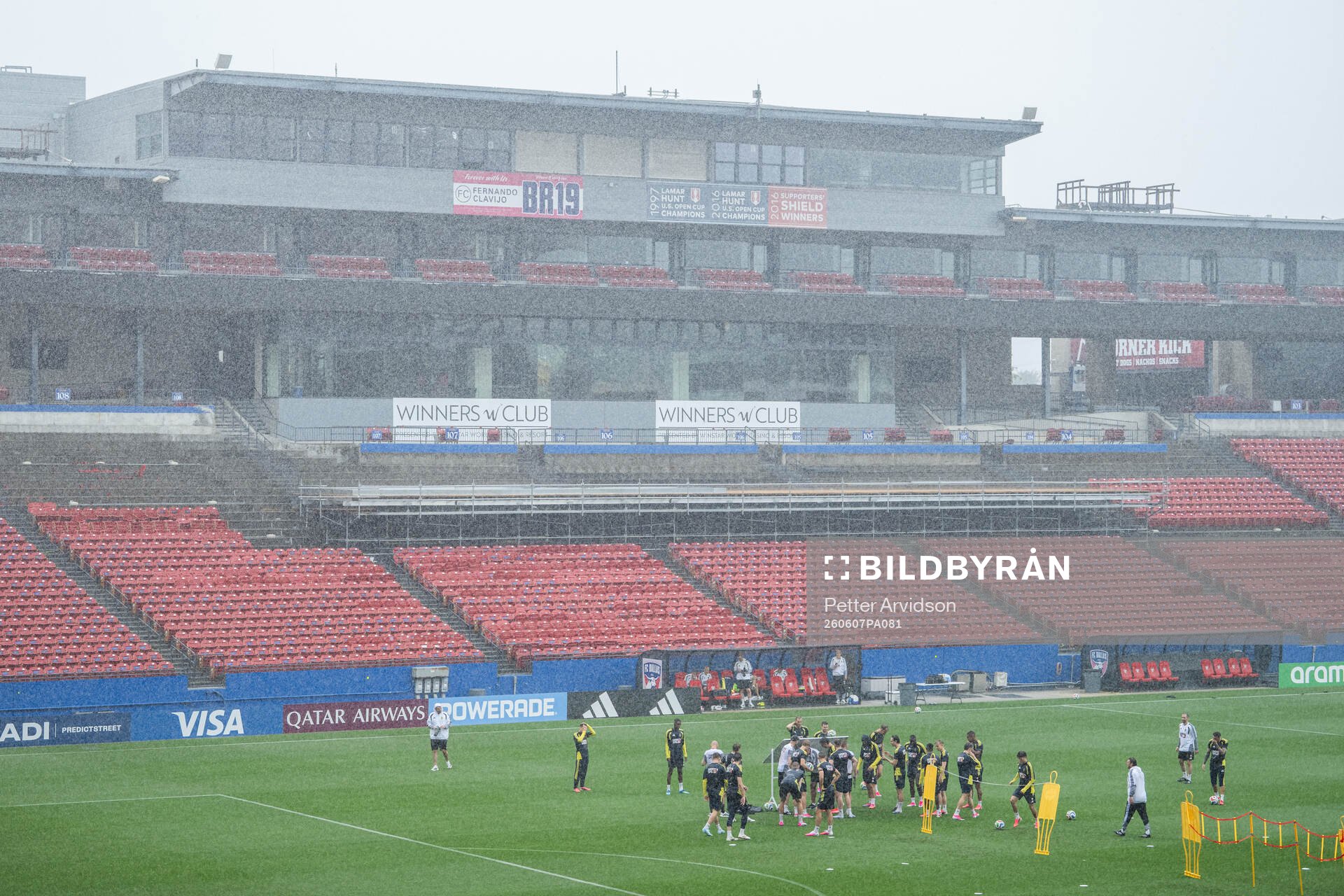 Players of the Swedish national football team in the rain