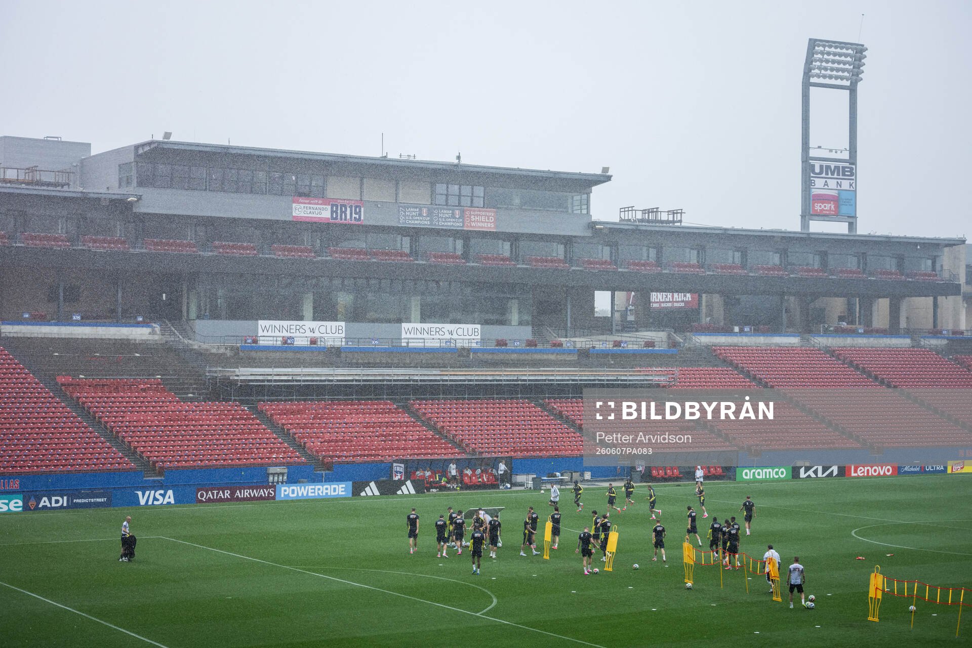 Players of the Swedish national football team in the rain