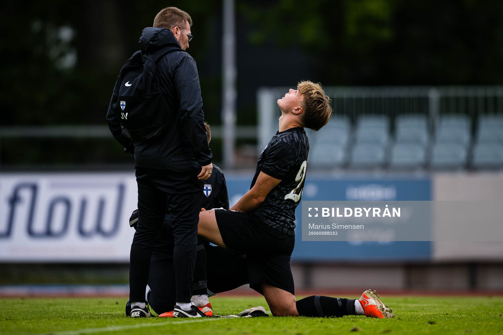 Goalkeeper Ukko Happonen of Finland in pain