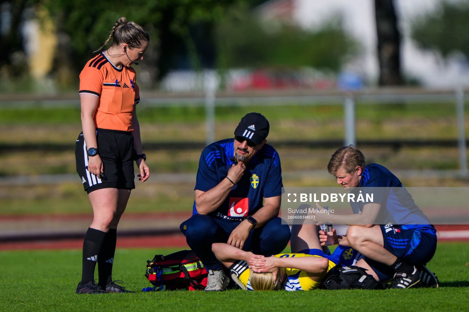 Wilma Leidhammar of Sweden receives medical attention by