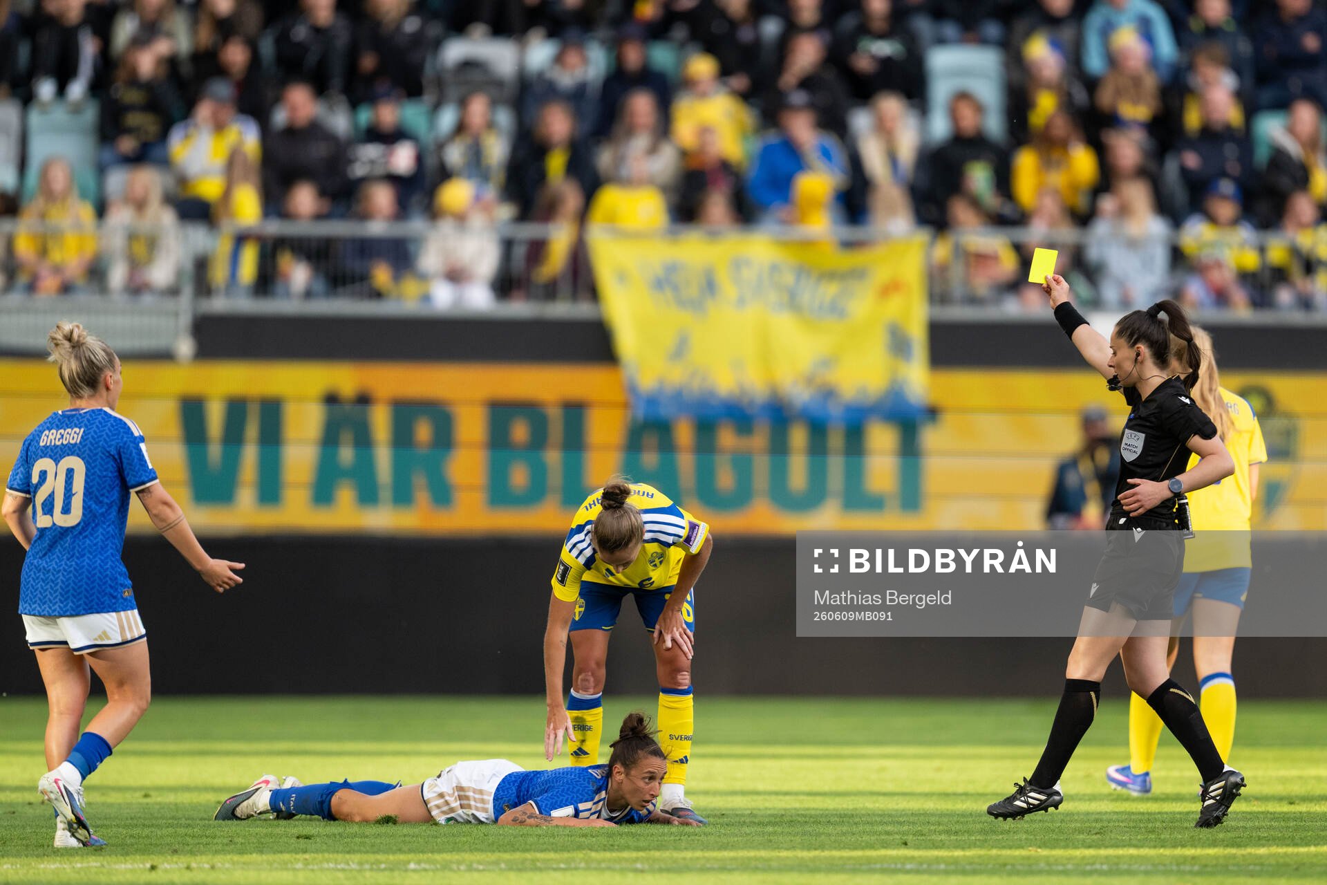 Filippa Angeldahl of Sweden receives a yellow card from