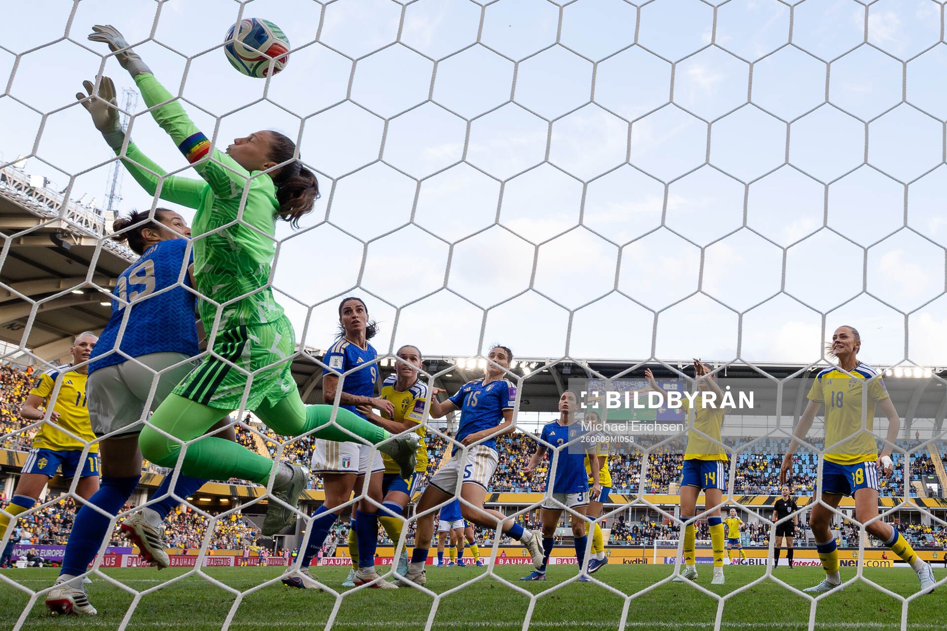 Hanna Lundkvist of Sweden scores 1-2 behind goalkeeper